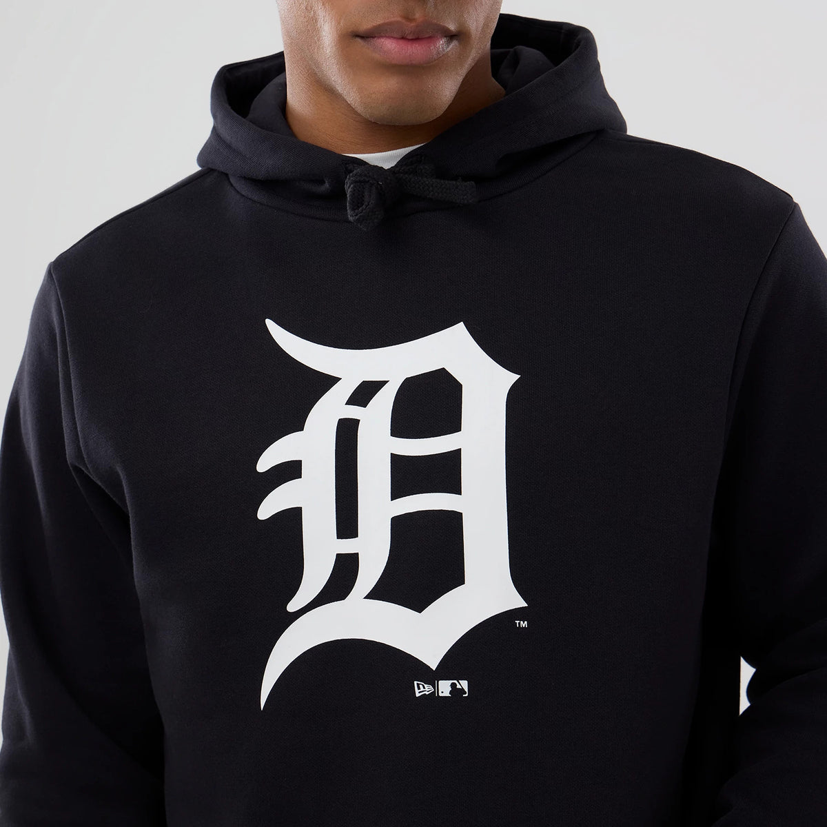 New Era Detroit Tigers MLB Navy Pullover Hoodie, front view showing the large white Detroit Tigers logo printed in the centre of the chest, with a drawstring hood and the New Era and MLB logos printed beneath it.