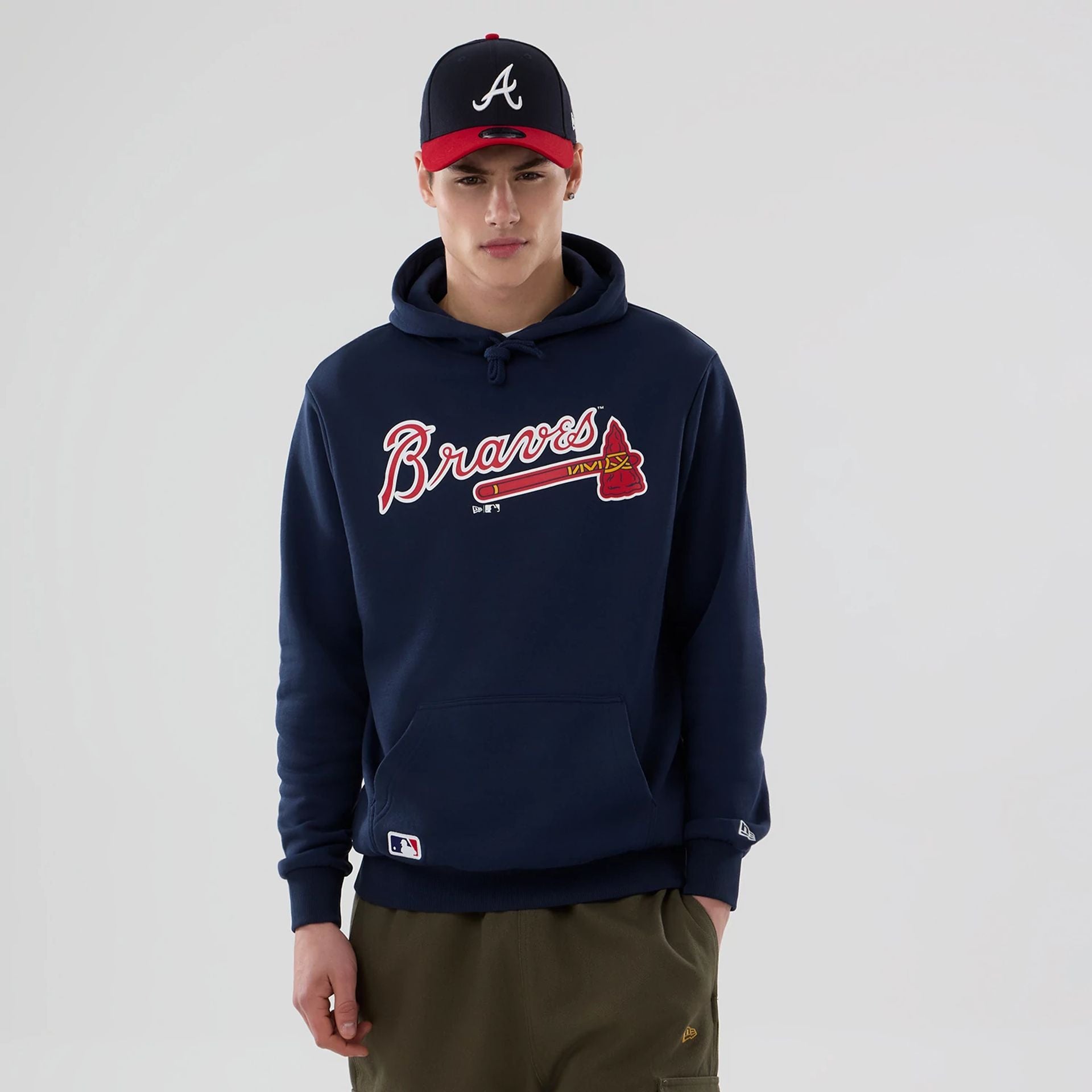 The Male model is wearing Atlanta Braves MLB Dark Blue Pullover Hoodie 1