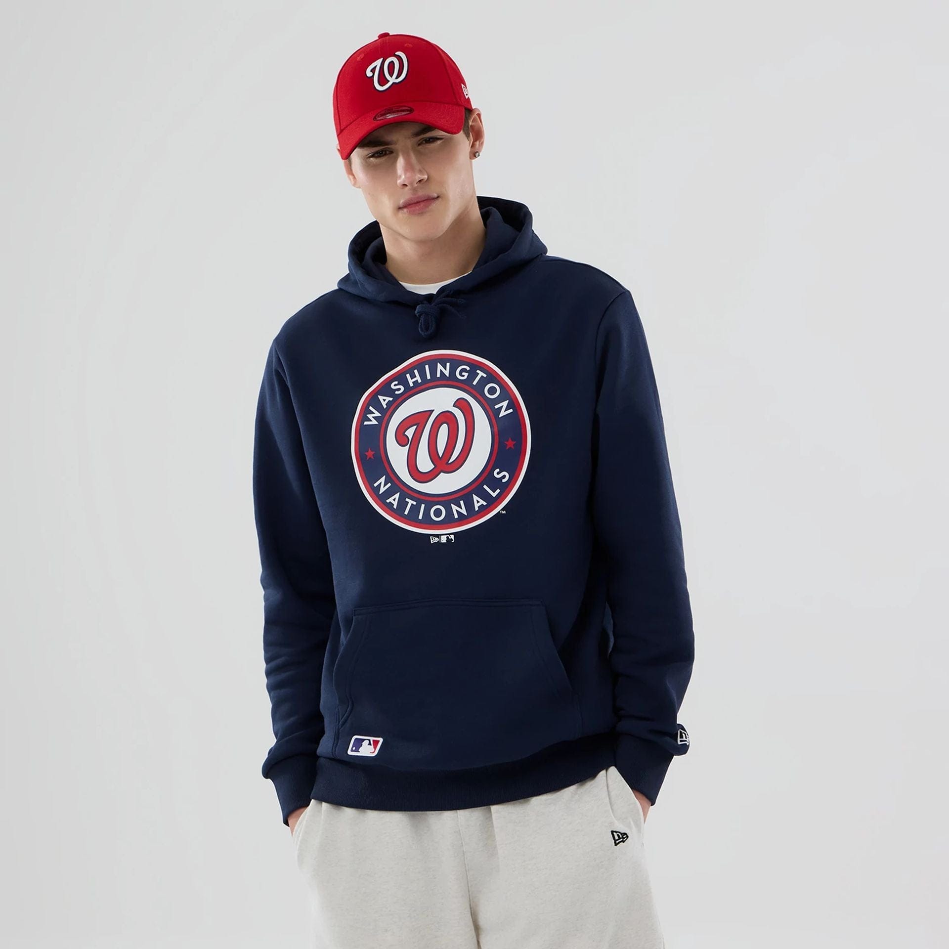 The Male model is wearing Washington Nationals MLB Dark Blue Pullover Hoodie 1