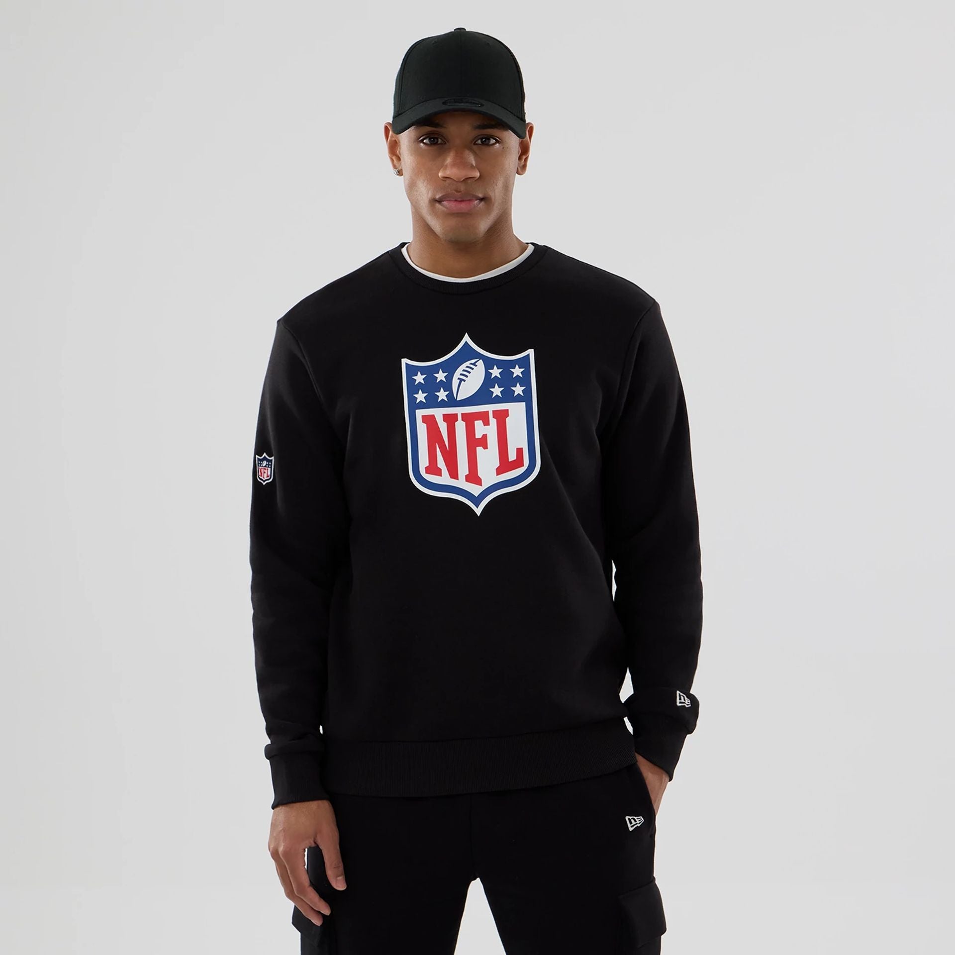 The Male model is wearing NFL Generic Logo Black Crew Neck Sweater 1