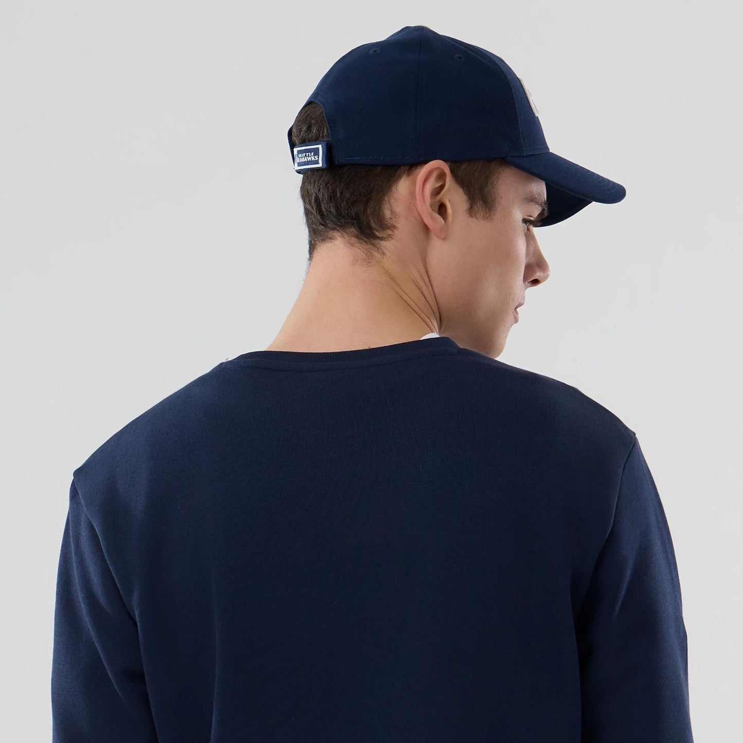 The Male model is wearing Seattle Seahawks NFL Dark Blue Crew Neck Sweater 7