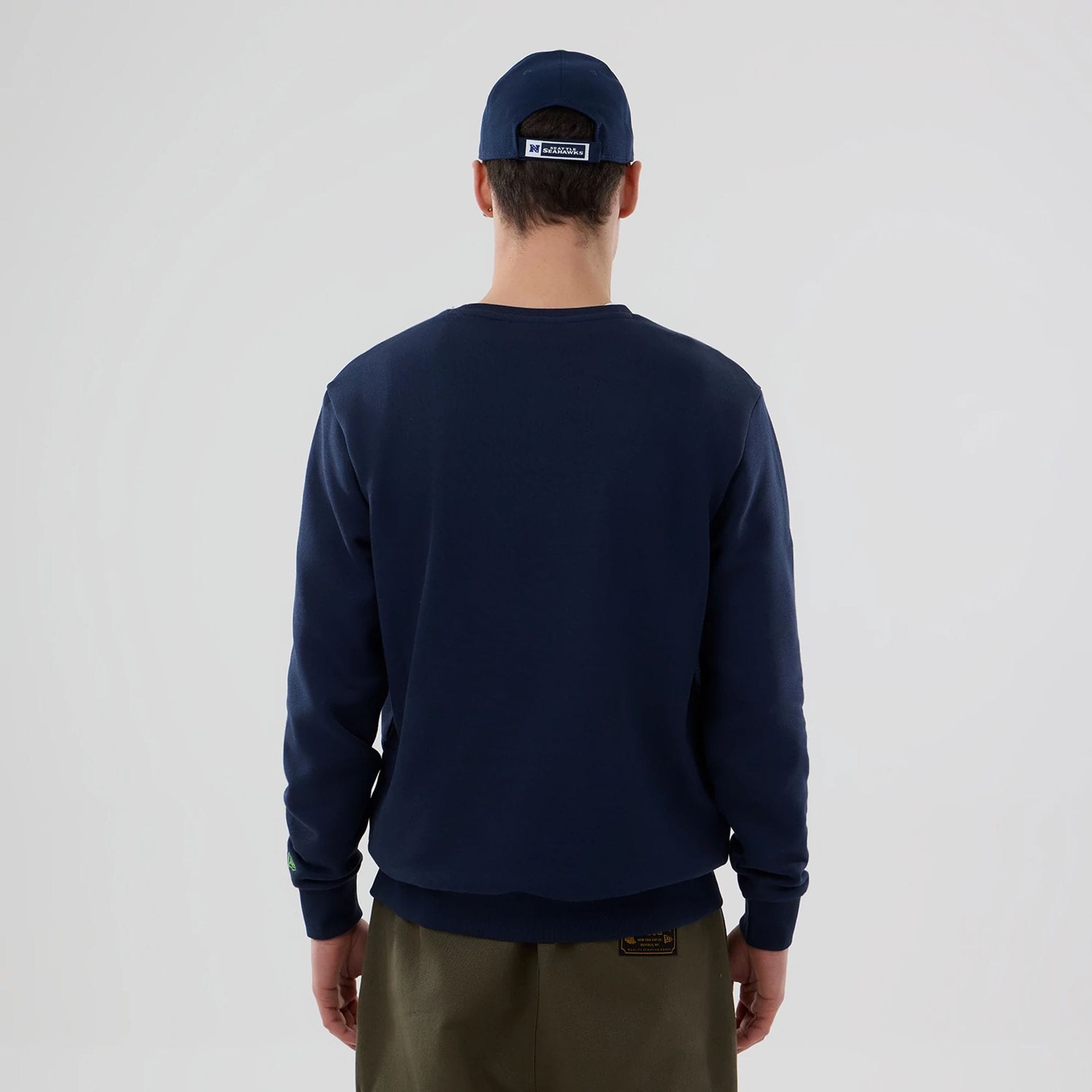 The Male model is wearing Seattle Seahawks NFL Dark Blue Crew Neck Sweater 2