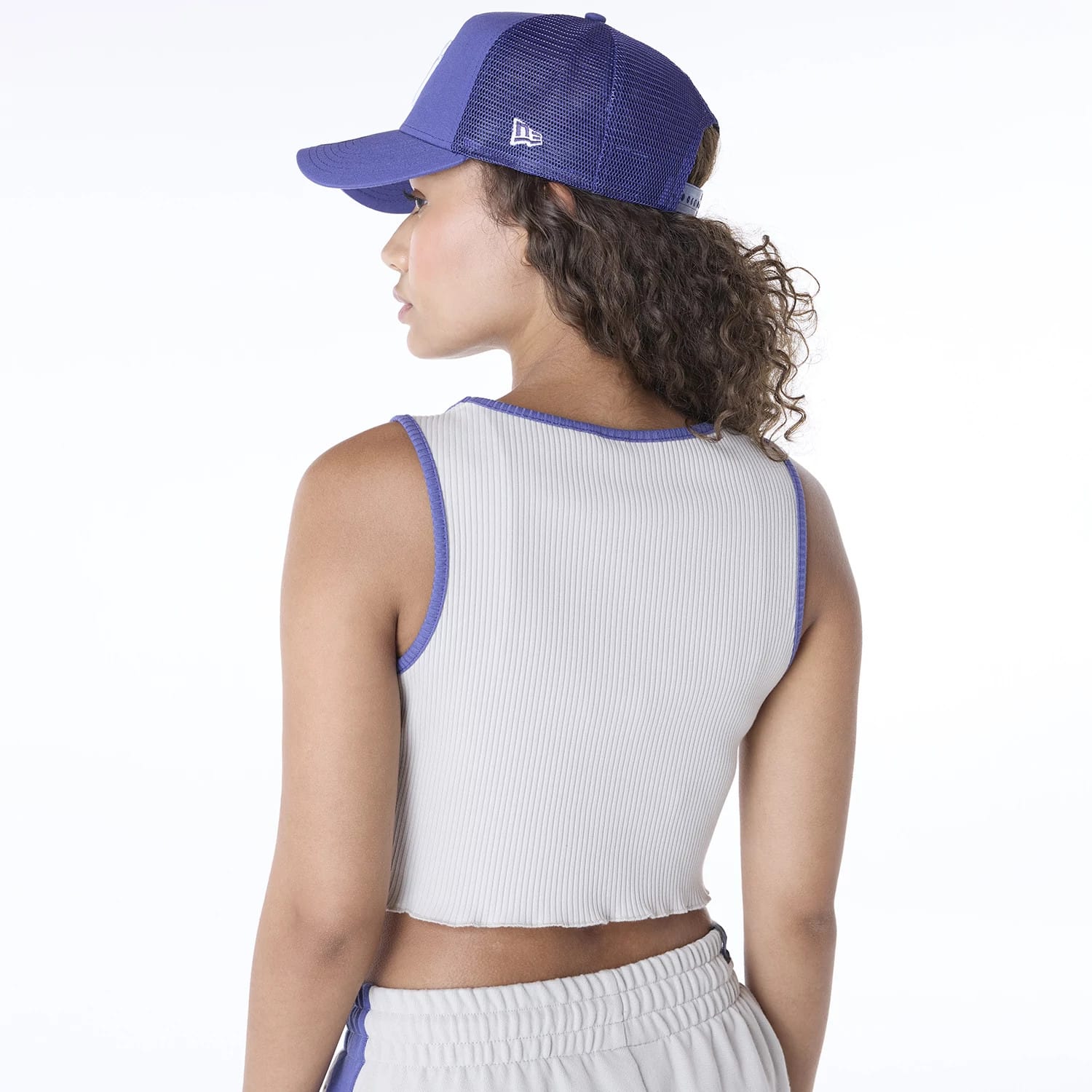 The Female model is wearing New York Yankees Womens MLB Floral Light Beige Vest 2