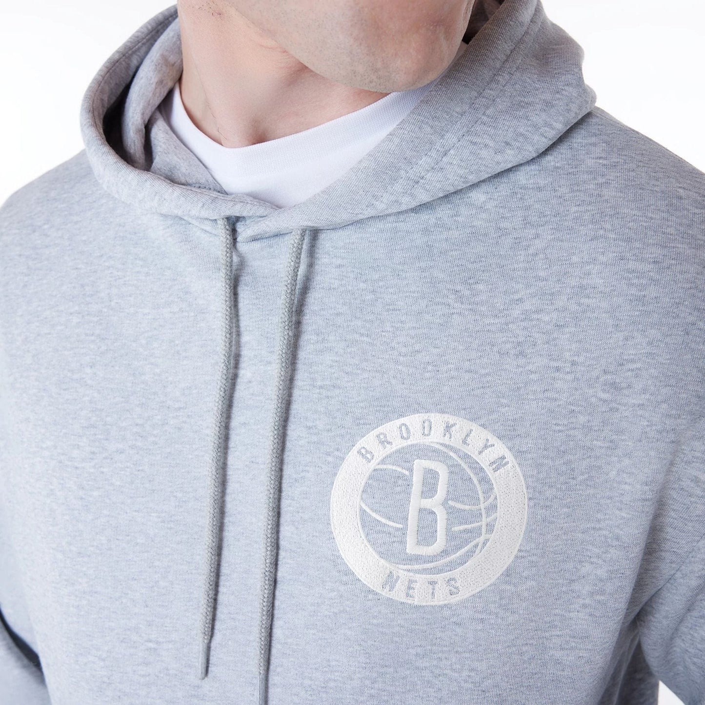 The Male model is wearing Brooklyn Nets NBA League Essential Grey Oversized Pullover Hoodie 8