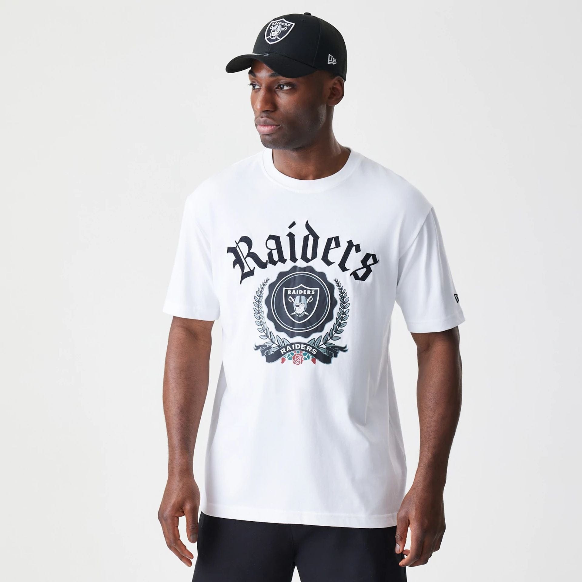 The Male model is wearing Las Vegas Raiders Throwback Prep White T-Shirt 1