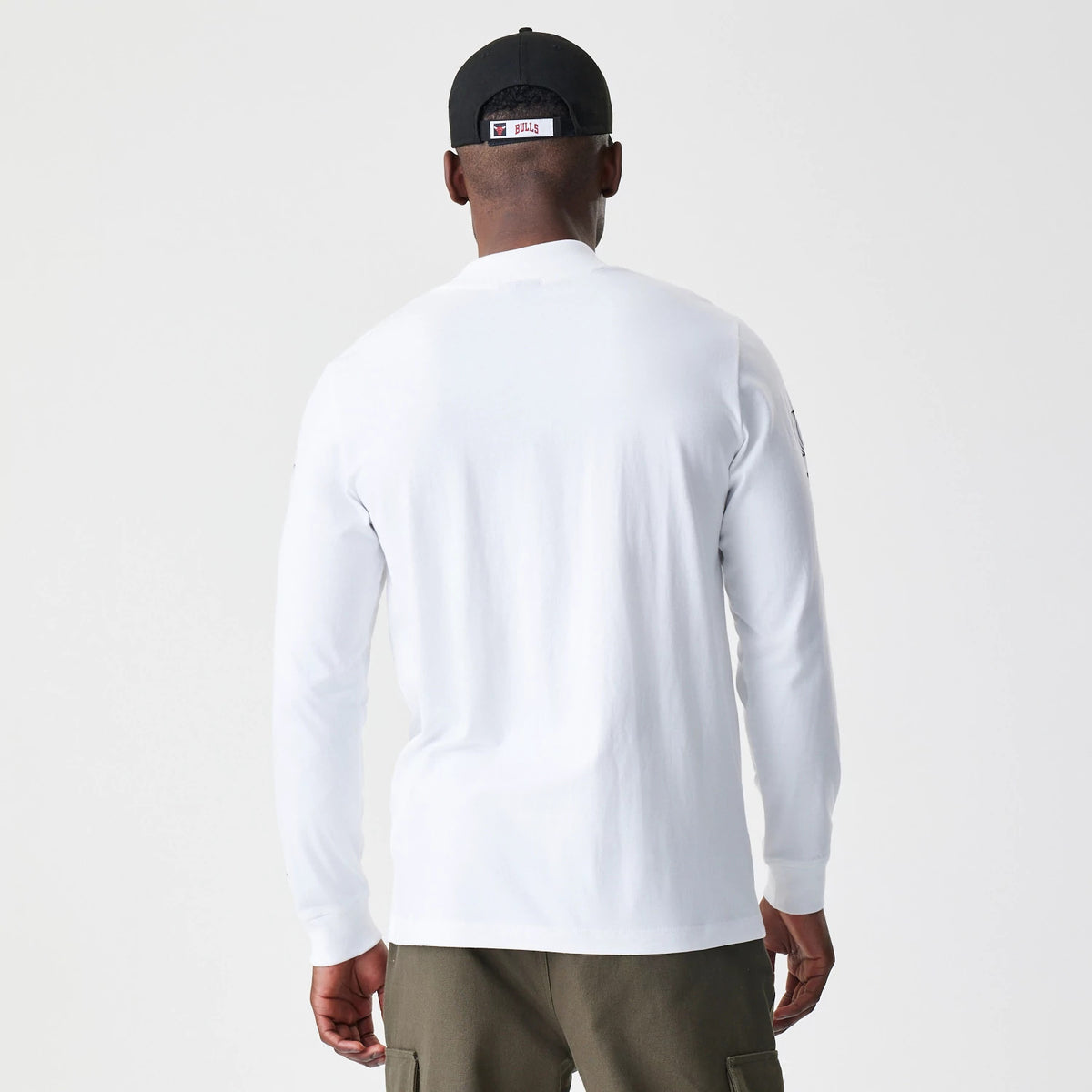 The Male model is wearing Chicago Bulls Modern Driver White Long Sleeve T-Shirt 2