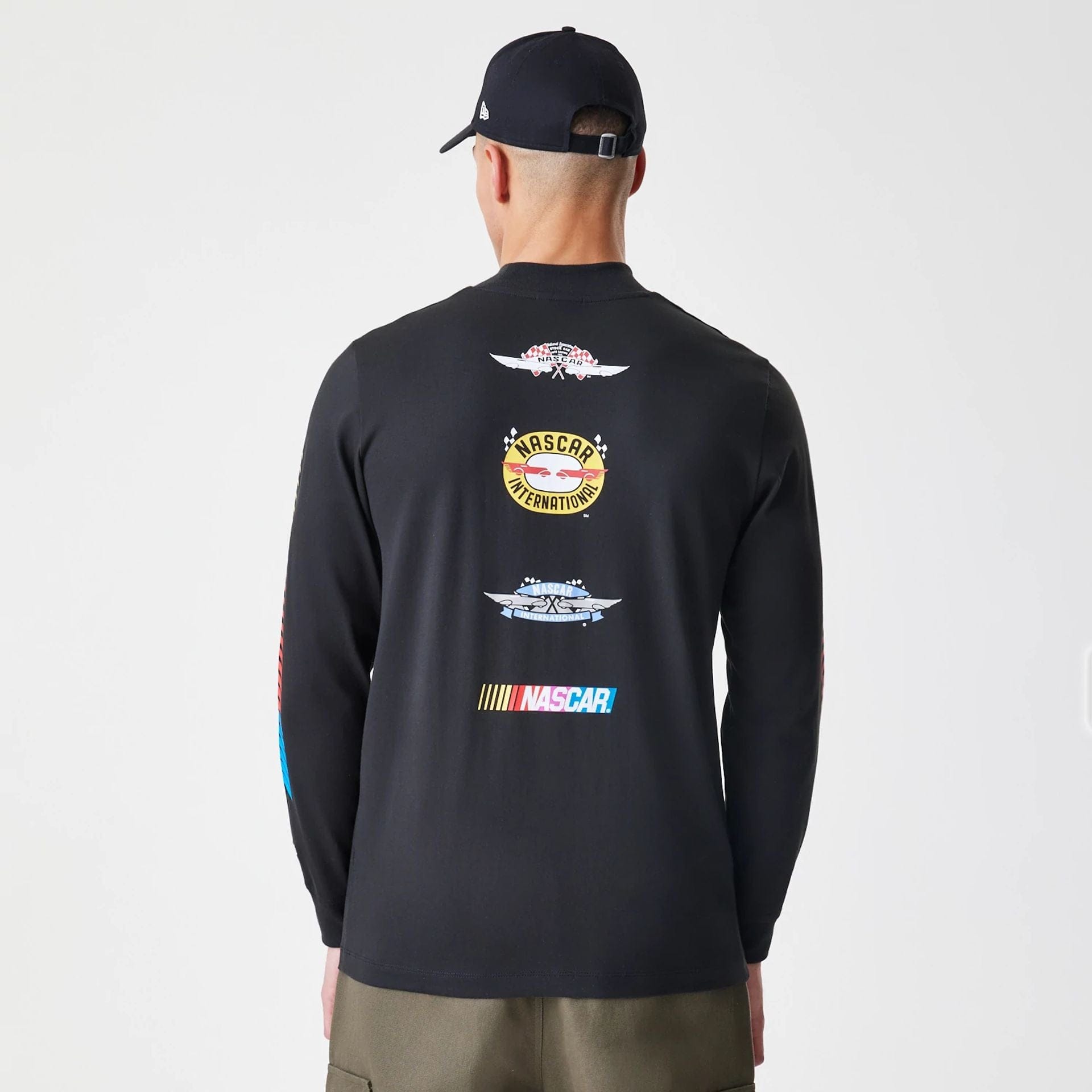 The Male model is wearing Nascar Generic Logo Modern Driver Black Long Sleeve T-Shirt 2