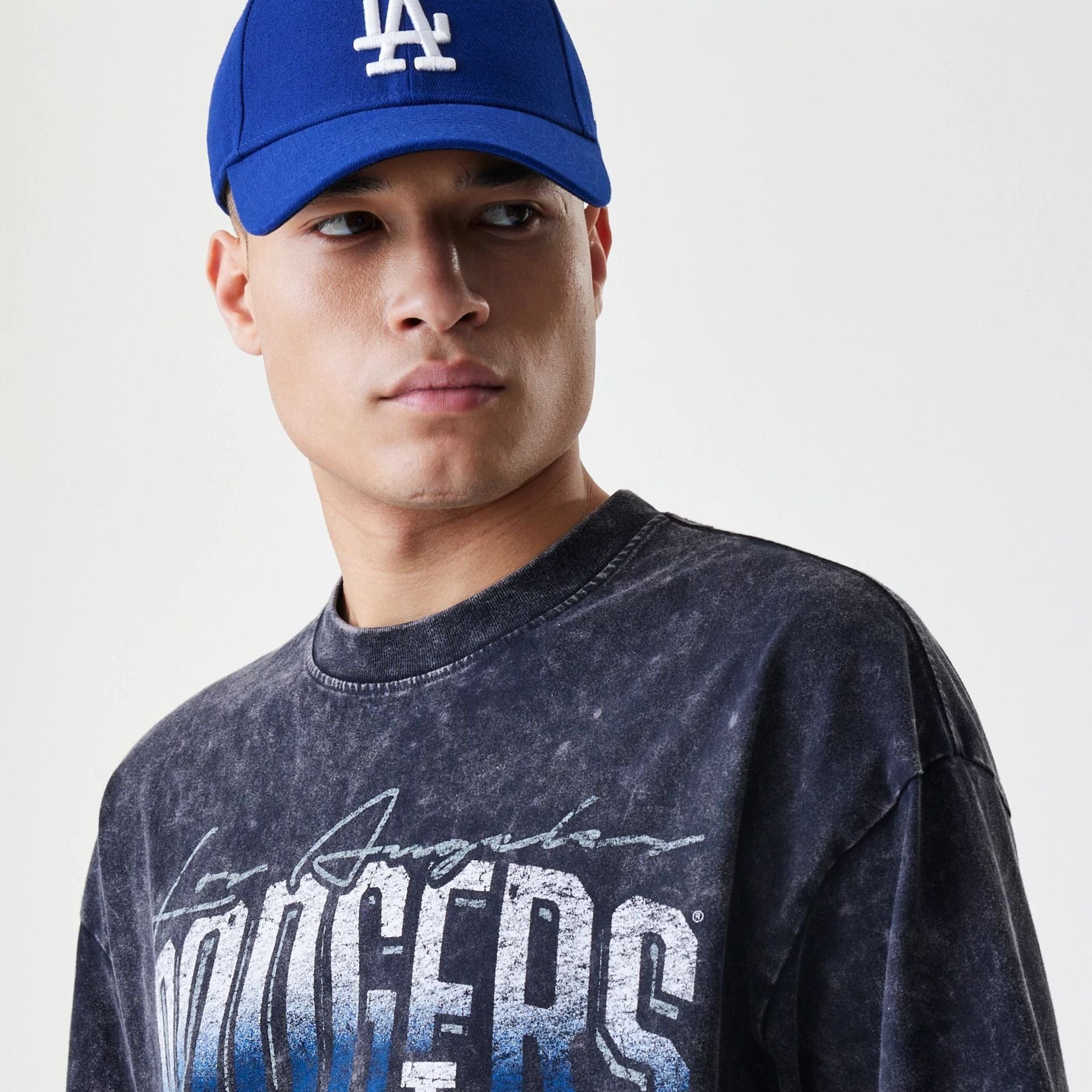 The Male model is wearing LA Dodgers Sport Classic Black T-Shirt 2