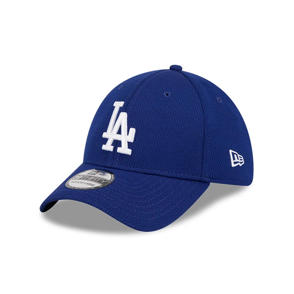 LA Dodgers MLB Evergreen Dark Blue New Era 39THIRTY Stretch Fit Cap, three-quarter view showing the white raised LA logo on the front panel, curved visor with 39THIRTY size sticker, and embroidered New Era flag logo on the left side.