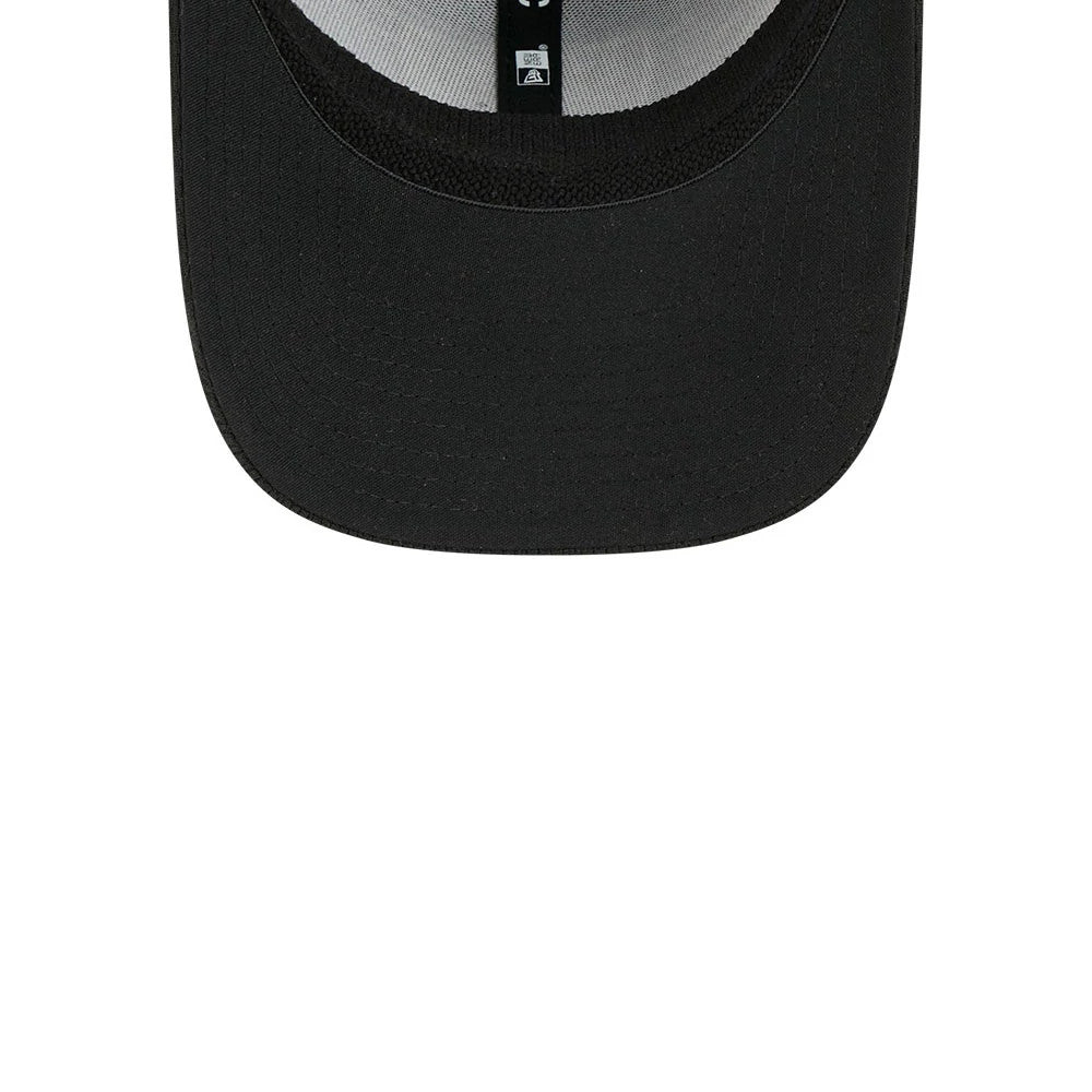 Las Vegas Raiders NFL Evergreen Black New Era 39THIRTY Stretch Fit Cap, inside view showing the black undervisor, white sweatband and inner taping with an MLB logo, centred along the top.
