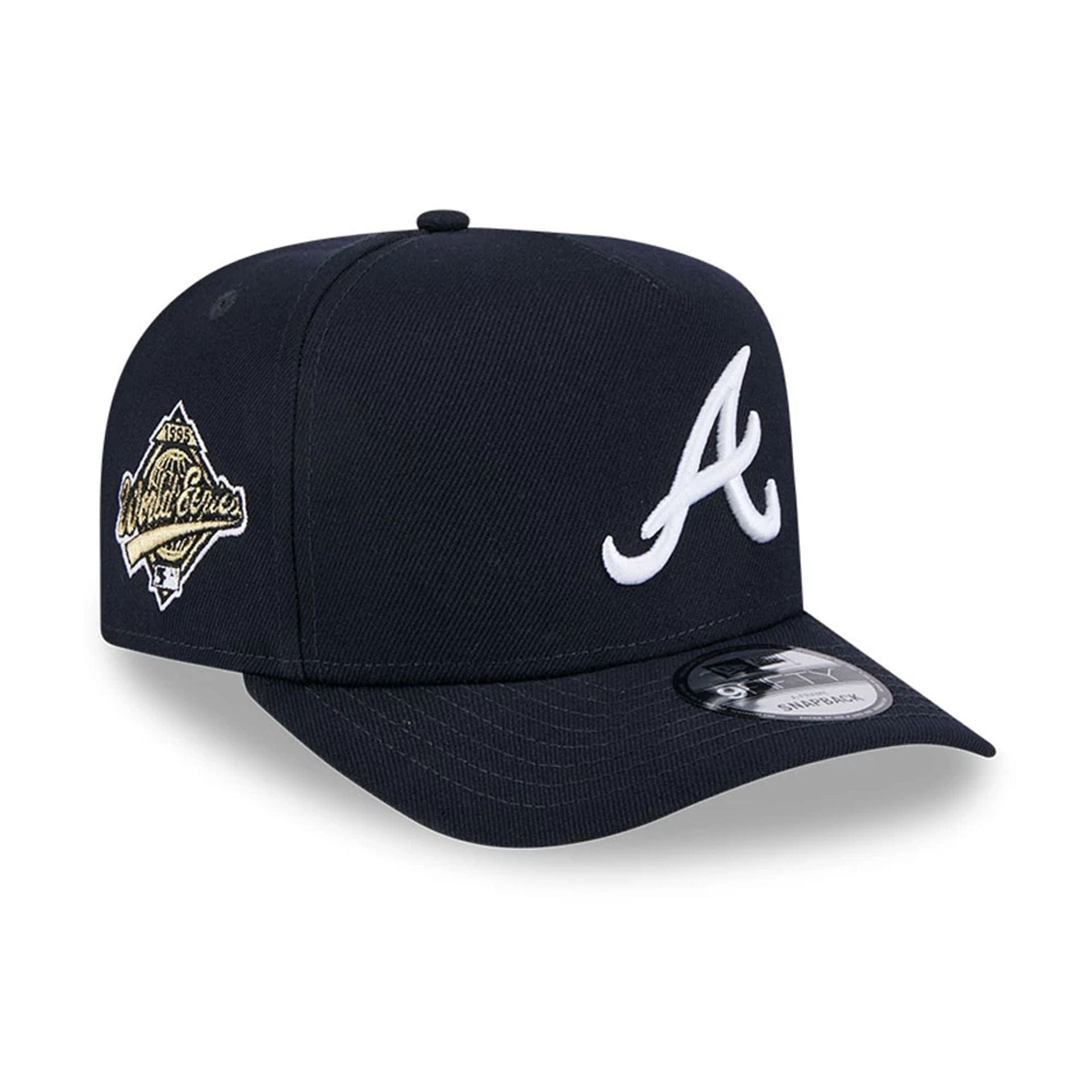 Pictured is this MLB Evergreen Atlanta Braves 9FIFTY A-Frame Snapback cap in navy. 1