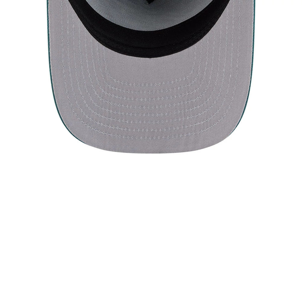 Eagles NFL Evergreen Dark Green New Era 9FIFTY A-Frame Snapback Adjustable Cap, inside view showing the black sweatband and grey undervisor with detailed stitching, highlighting the structured interior design.