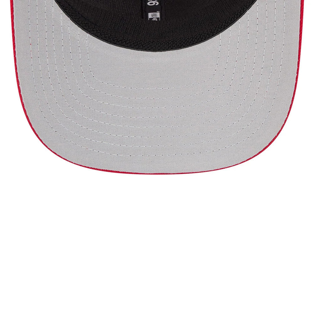 LA Angels MLB Evergreen Red New Era 9SEVENTY Stretch Snap Adjustable Cap, inside view showing grey undervisor with red edging, black sweatband, and taping with a 9SEVENTY size sticker on the underside of the visor.