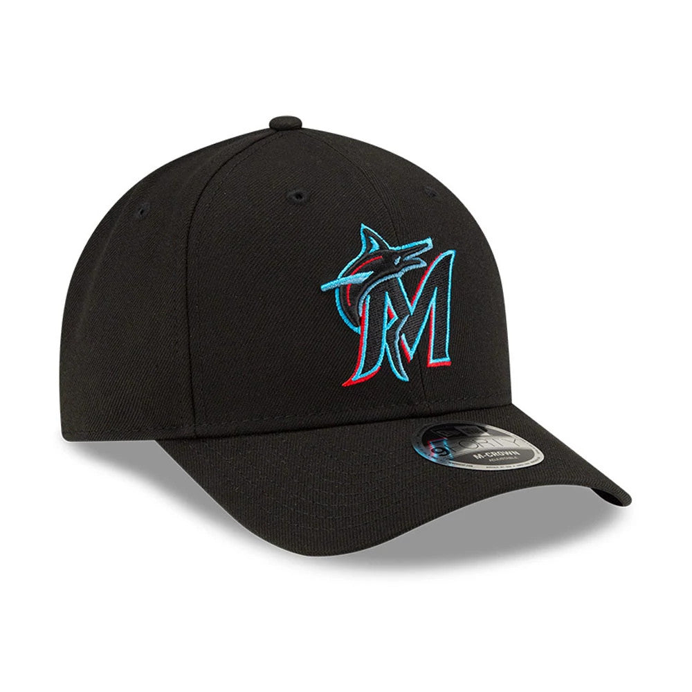 Miami Marlins MLB Player Replica Black New Era 9FORTY M-Crown Adjustable Cap, front view showing the embroidered Miami Marlins logo in turquoise and red on the structured black crown, with a 9FORTY size sticker on the curved black visor.