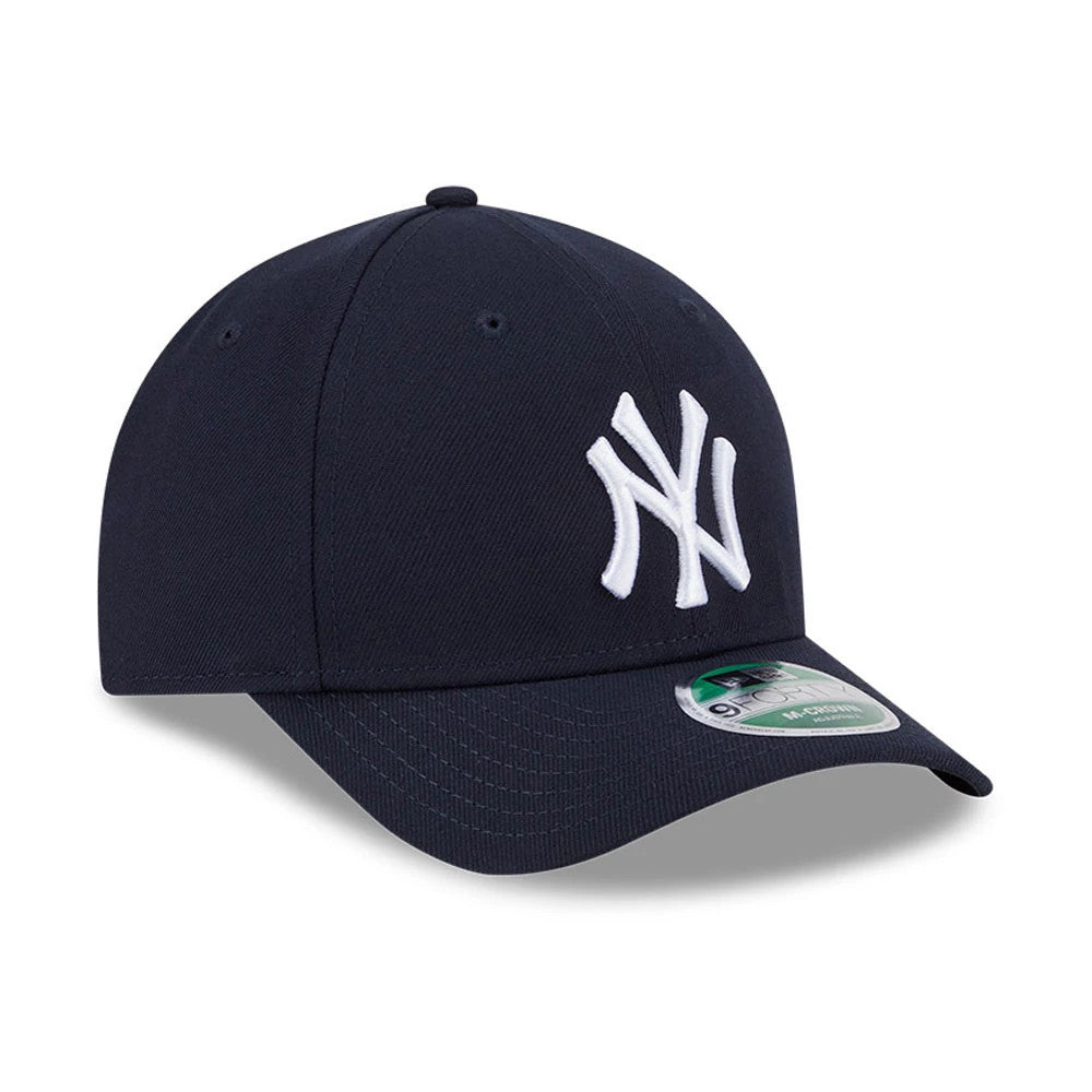 New York Yankees MLB Player Replica Navy New Era 9FORTY M-Crown Adjustable Cap, three-quarter view with a raised white NY logo on the front panel, a rounded navy visor, and a 9FORTY size sticker on top of the visor.