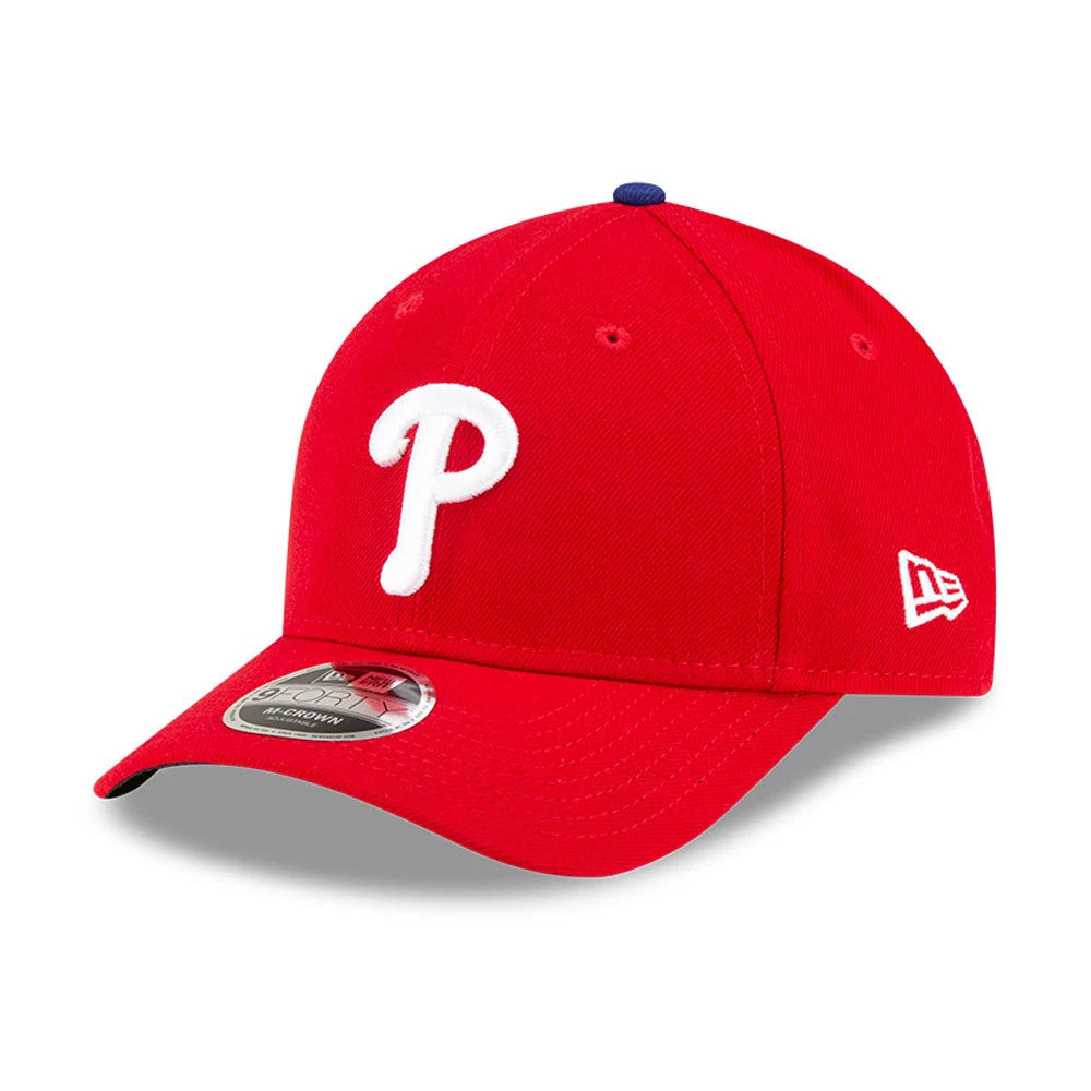 Philadelphia Phillies MLB Player Replica Red New Era 9FORTY M-Crown Adjustable Cap, three-quarter view showing the white embroidered P logo on the front panel, curved visor with 9FORTY size sticker, and New Era flag logo on the left side.