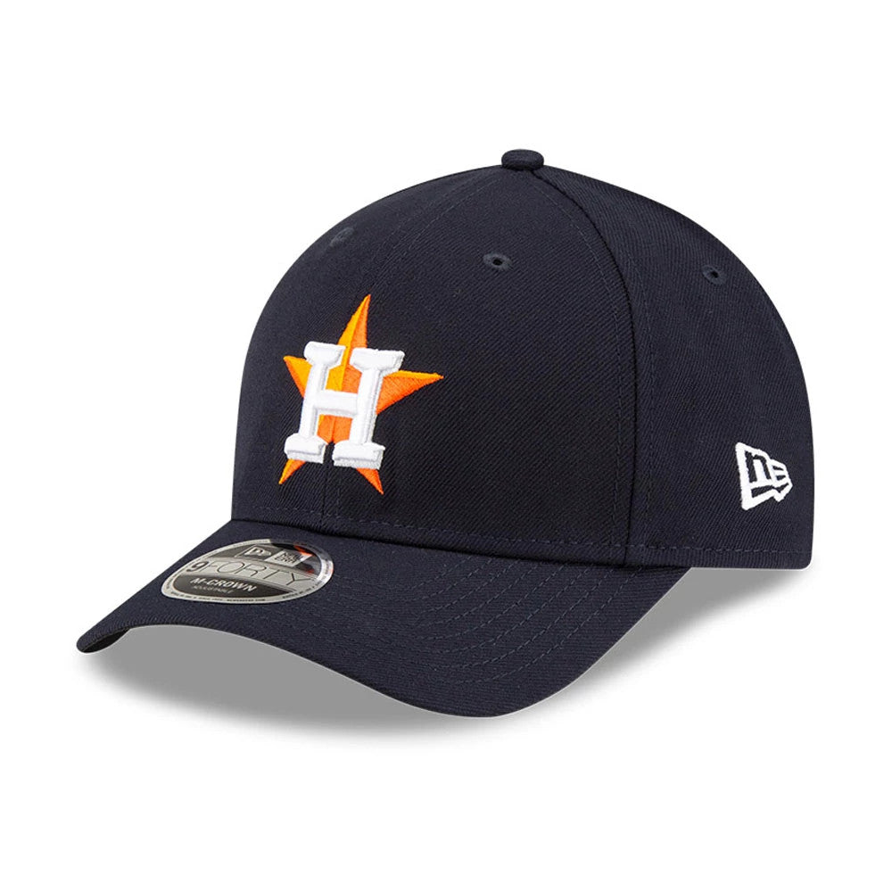 Houston Astros MLB Player Replica Navy New Era 9FORTY M-Crown Adjustable Cap, three-quarter view showing the raised white and orange H logo on the front panel, curved visor with 9FORTY size sticker, and New Era flag logo on the left side.