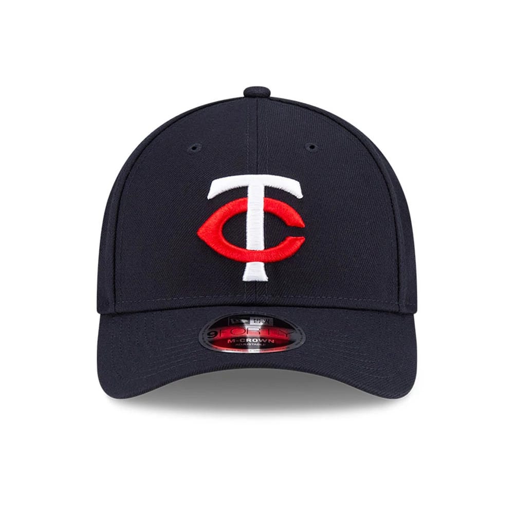 Minnesota Twins MLB Player Replica Navy New Era 9FORTY M-Crown Adjustable Cap, front view showing the raised white and red TC logo embroidered on the front panel above the curved visor with a 9FORTY size sticker.