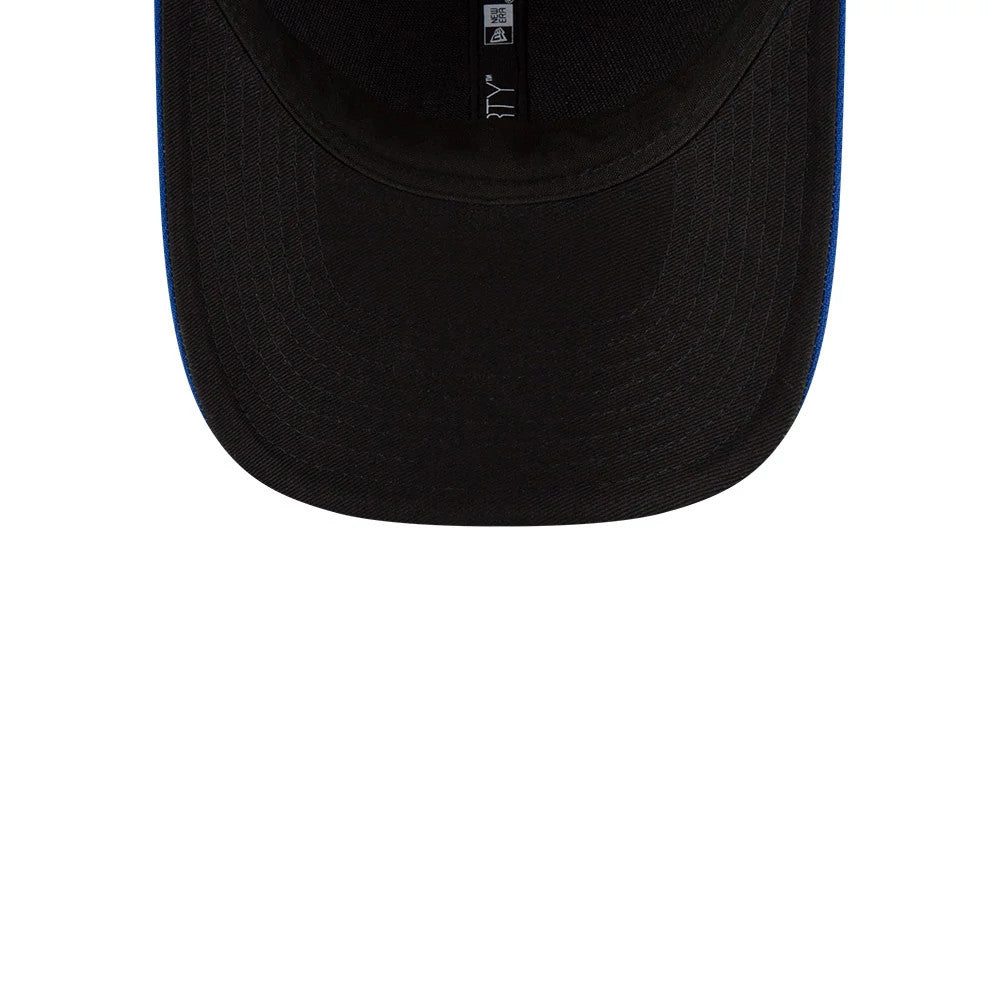 Toronto Blue Jays MLB Player Replica Blue New Era 9FORTY M-Crown Adjustable Cap, inside view with black taping featuring the New Era and 9FORTY logos on the black undervisor, highlighting the curved visor design.