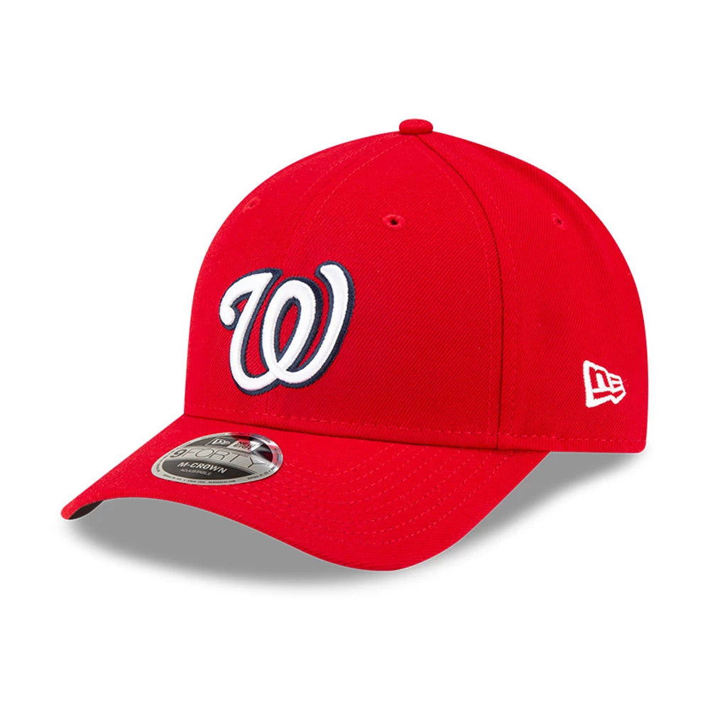 Washington Nationals MLB Player Replica Red New Era 9FORTY M-Crown Adjustable Cap, three-quarter view showing the raised white embroidered W logo on the front panel, curved visor with 9FORTY size sticker, and white New Era flag logo on the left side.