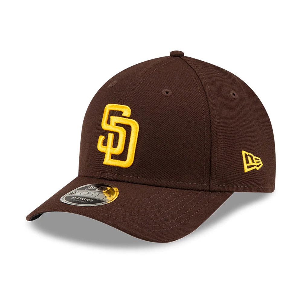 San Diego Padres MLB Player Replica Dark Brown New Era 9FORTY M-Crown Adjustable Cap, front view with raised yellow SD logo on the front panel, dark brown visor featuring the 9FORTY size sticker, and New Era flag logo on the left side.