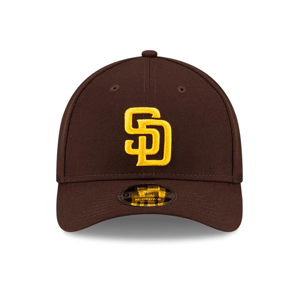 San Diego Padres MLB Player Replica Dark Brown New Era 9FORTY M-Crown Adjustable Cap, front view with raised yellow SD logo embroidered on the front panel and a 9FORTY size sticker on the brown visor.