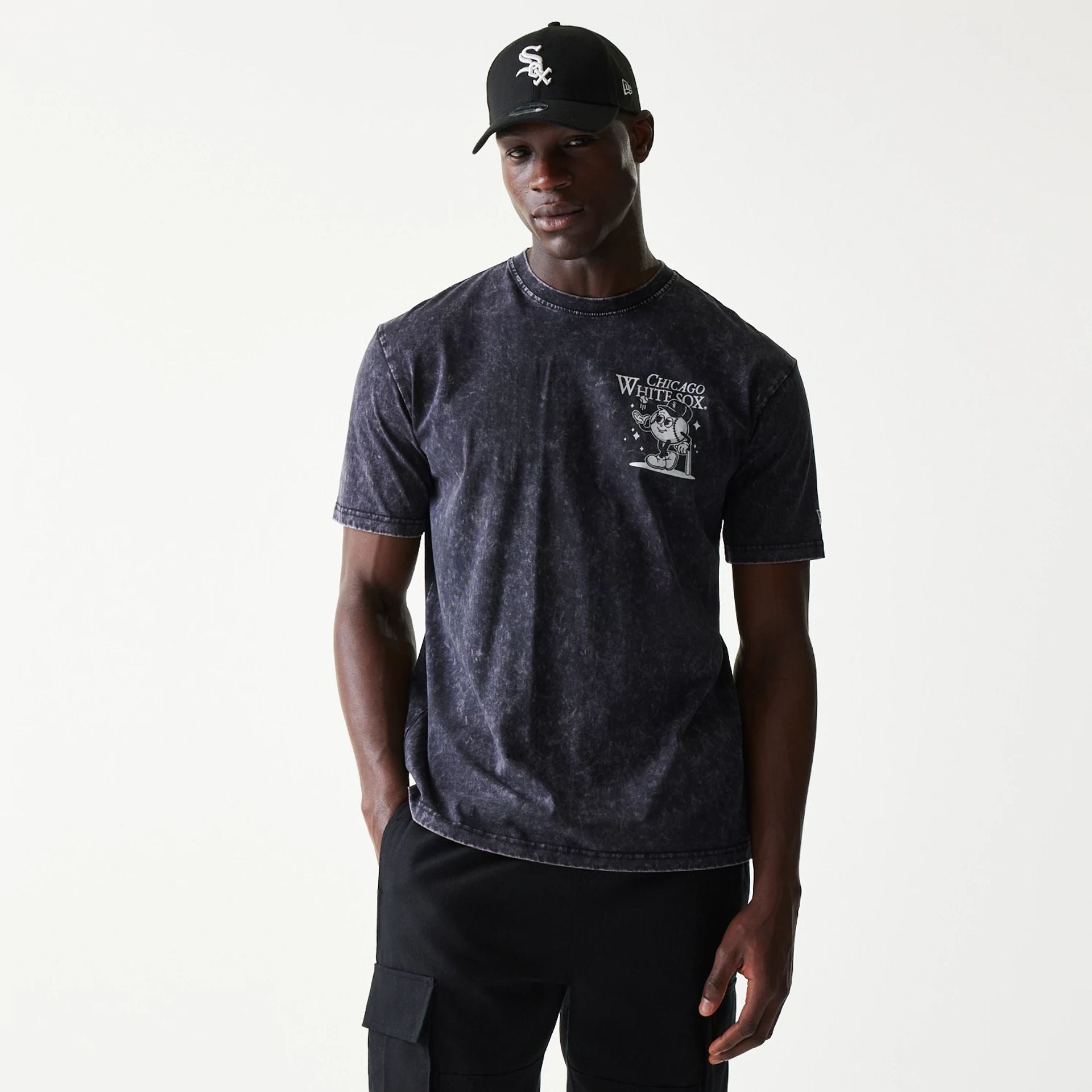 The Male model is wearing Chicago White Sox MLB Character Black T-Shirt 1