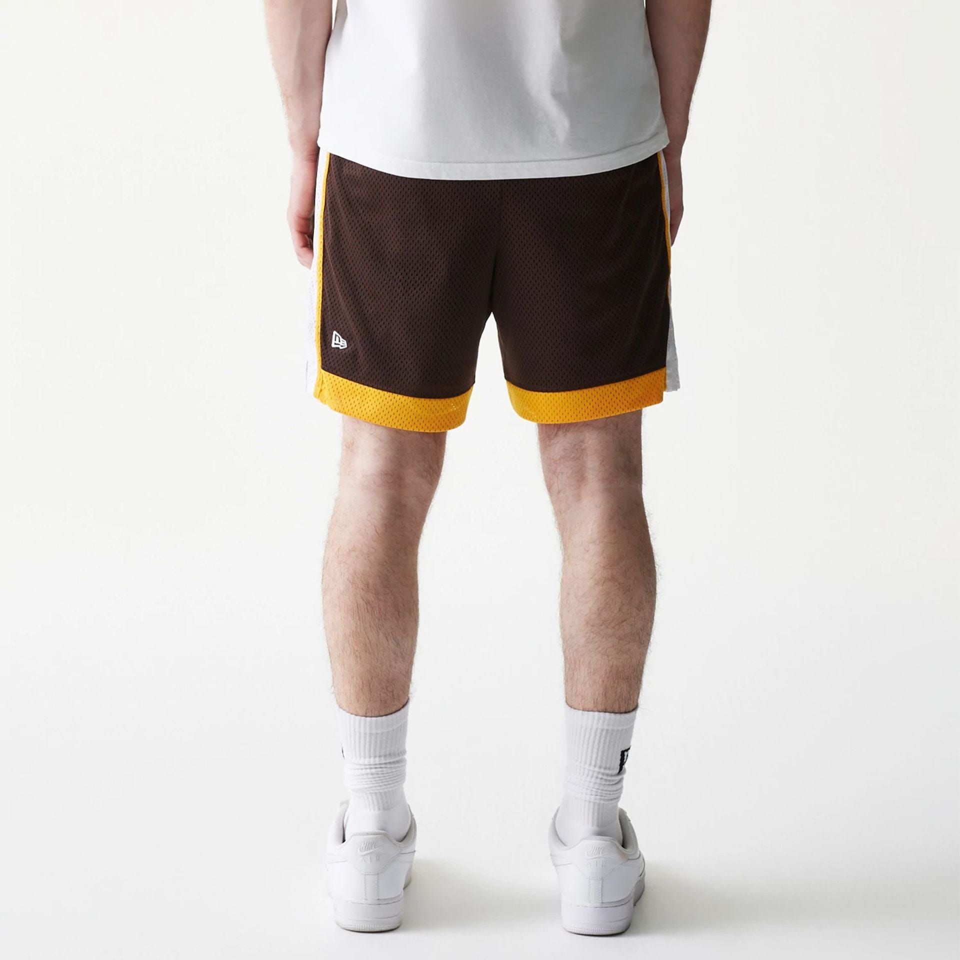 The Male model is wearing San Diego Padres Sport Classic Dark Brown Shorts 2