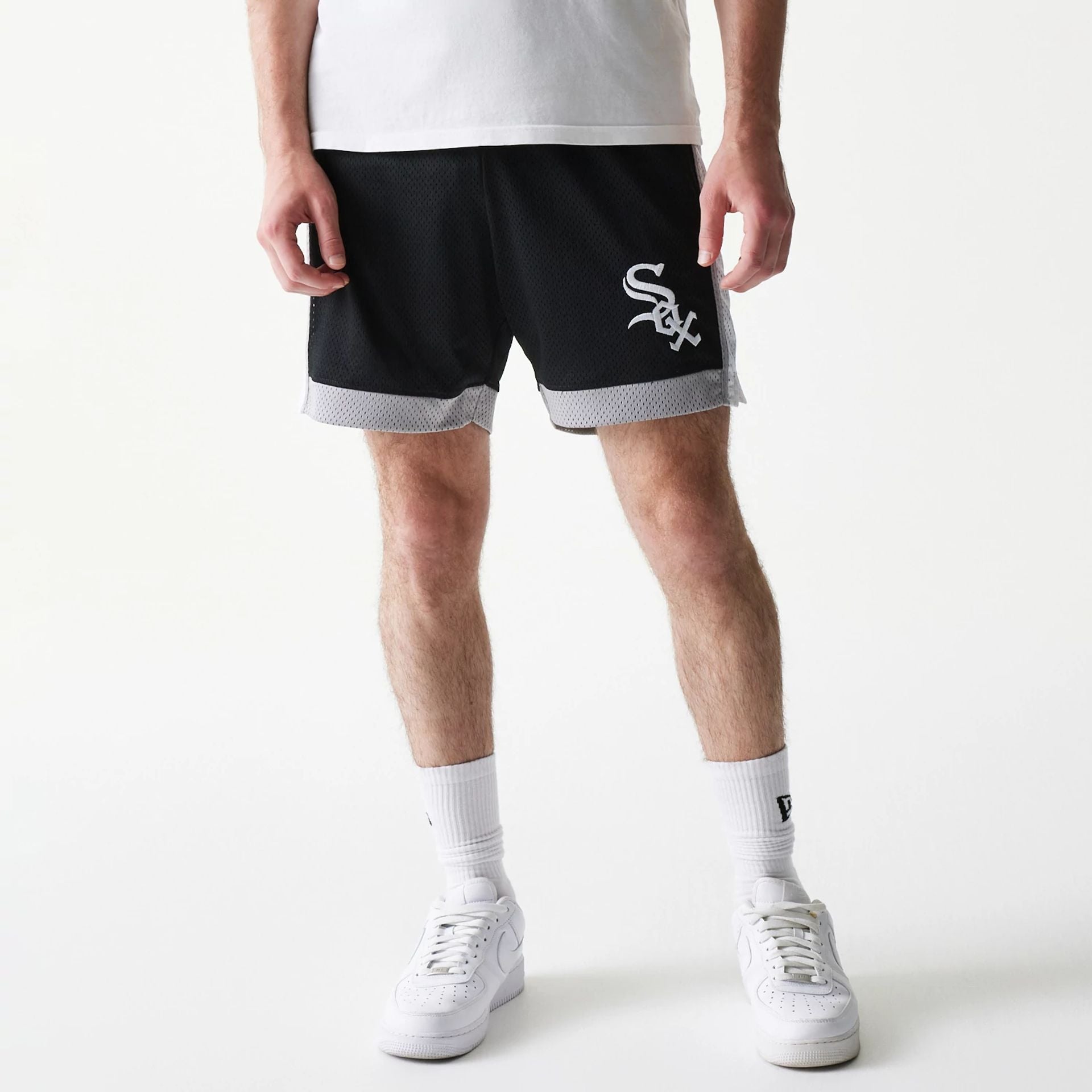 The Male model is wearing Chicago White Sox Sport Classic Black Shorts 1