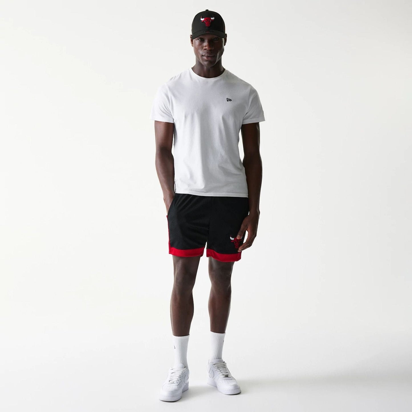 The Male model is wearing Chicago Bulls Sport Classic Black Shorts 8