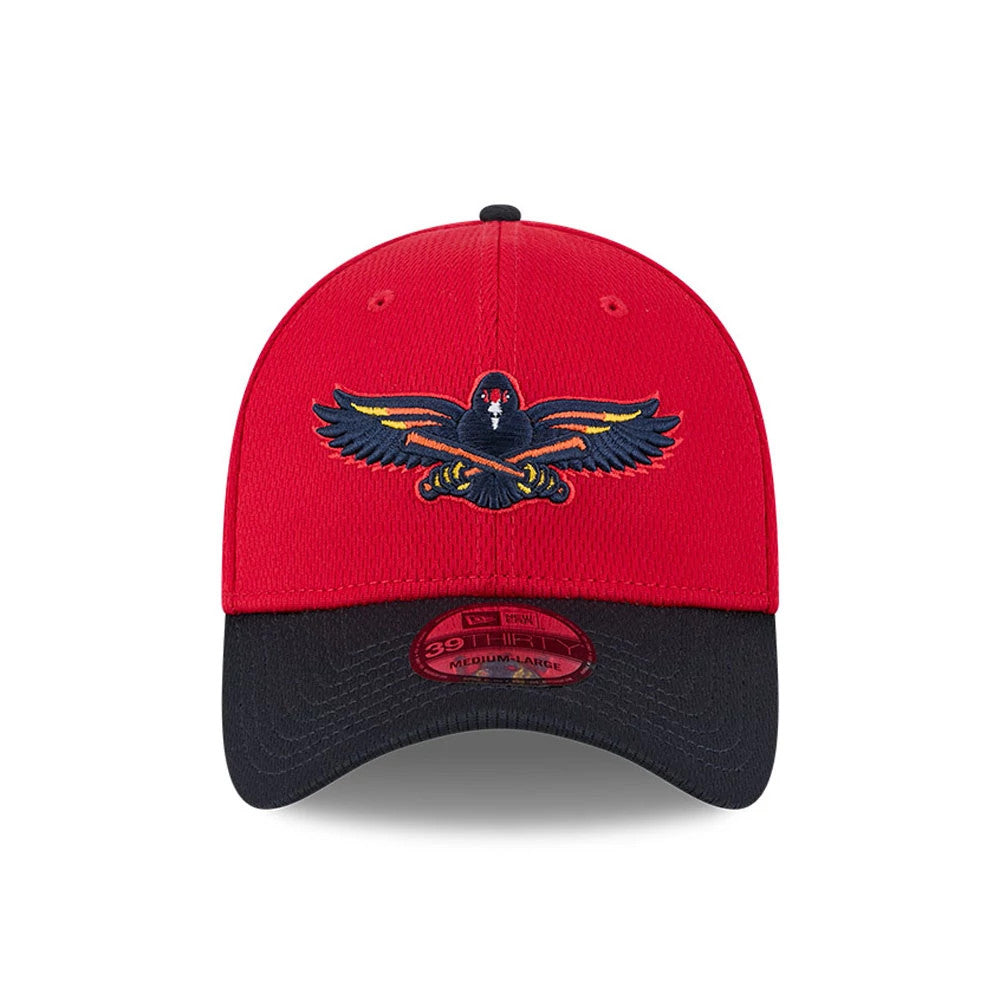 Toledo Mud Hens MiLB Batting Practice Red New Era 39THIRTY Stretch Fit Cap, front view showing the embroidered Mud Hens logo on the red crown, a curved black visor with a 39THIRTY size sticker, and a black top button.