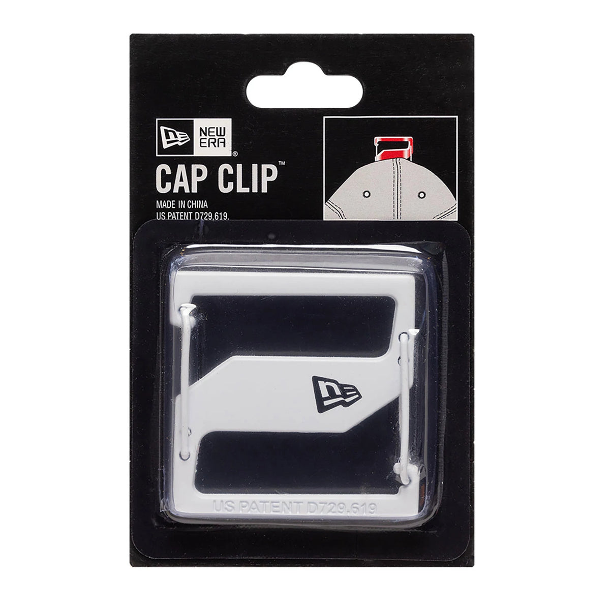New Era White Cap Clip, front view showing a white clip with the New Era flag logo, packaged in clear plastic on a black backing card with product details and an illustration of usage on the top panel.