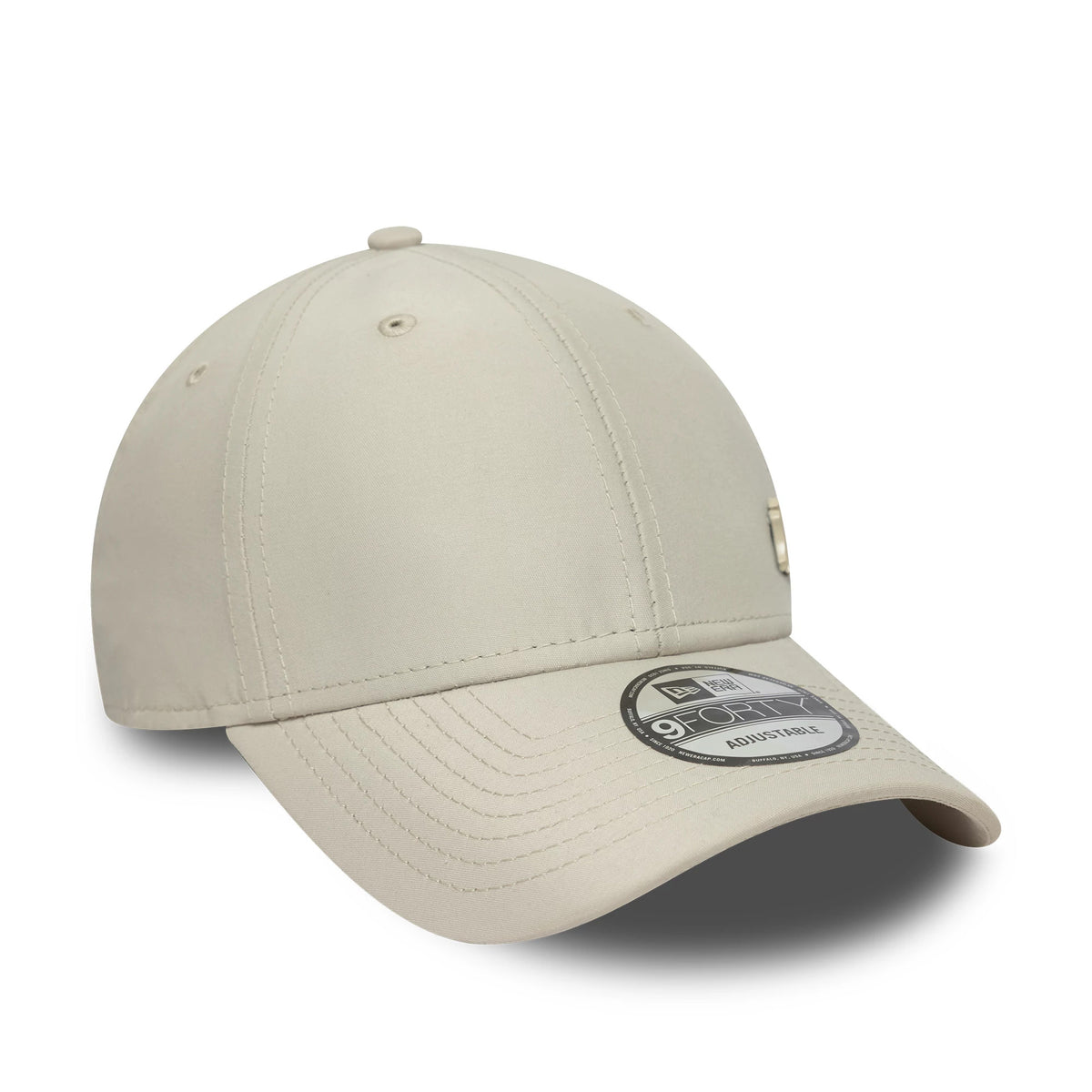 New York Yankees Tonal Flawless Cream New Era 9FORTY Adjustable Cap, three-quarter view showing the raised tonal New York Yankees logo on the front panel, a curved visor with a 9FORTY size sticker, and cream eyelets on the structured design.