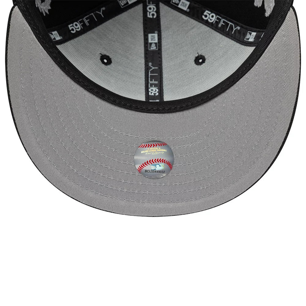 New York Yankees MLB Mythical Black New Era 59FIFTY Fitted Cap, inside view showing black 59FIFTY taping, black sweatband, grey undervisor, and baseball-themed sticker on the underside.