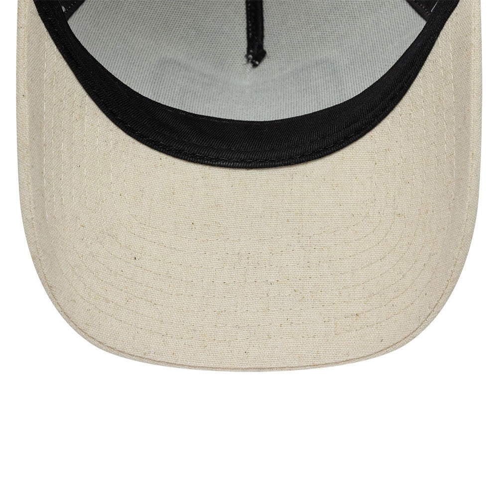 New Era Patch Line Cream 9FORTY E-Frame Adjustable Cap, inside view showing a black sweatband and grey undervisor with the structured crown design, featuring detailed stitching on the cream visor.
