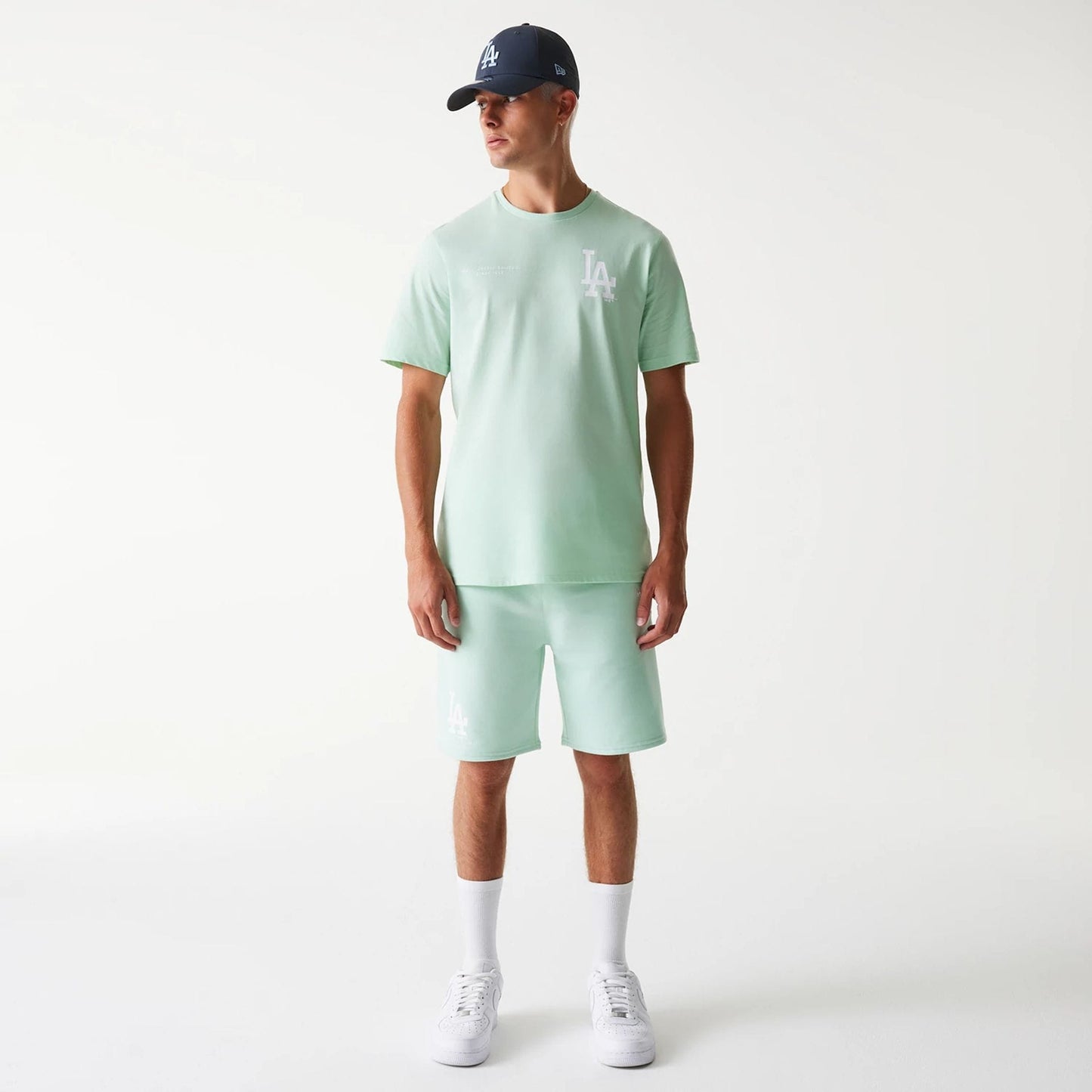 The Male model is wearing LA Dodgers MLB Arch Graphic Pastel Green T-Shirt 8