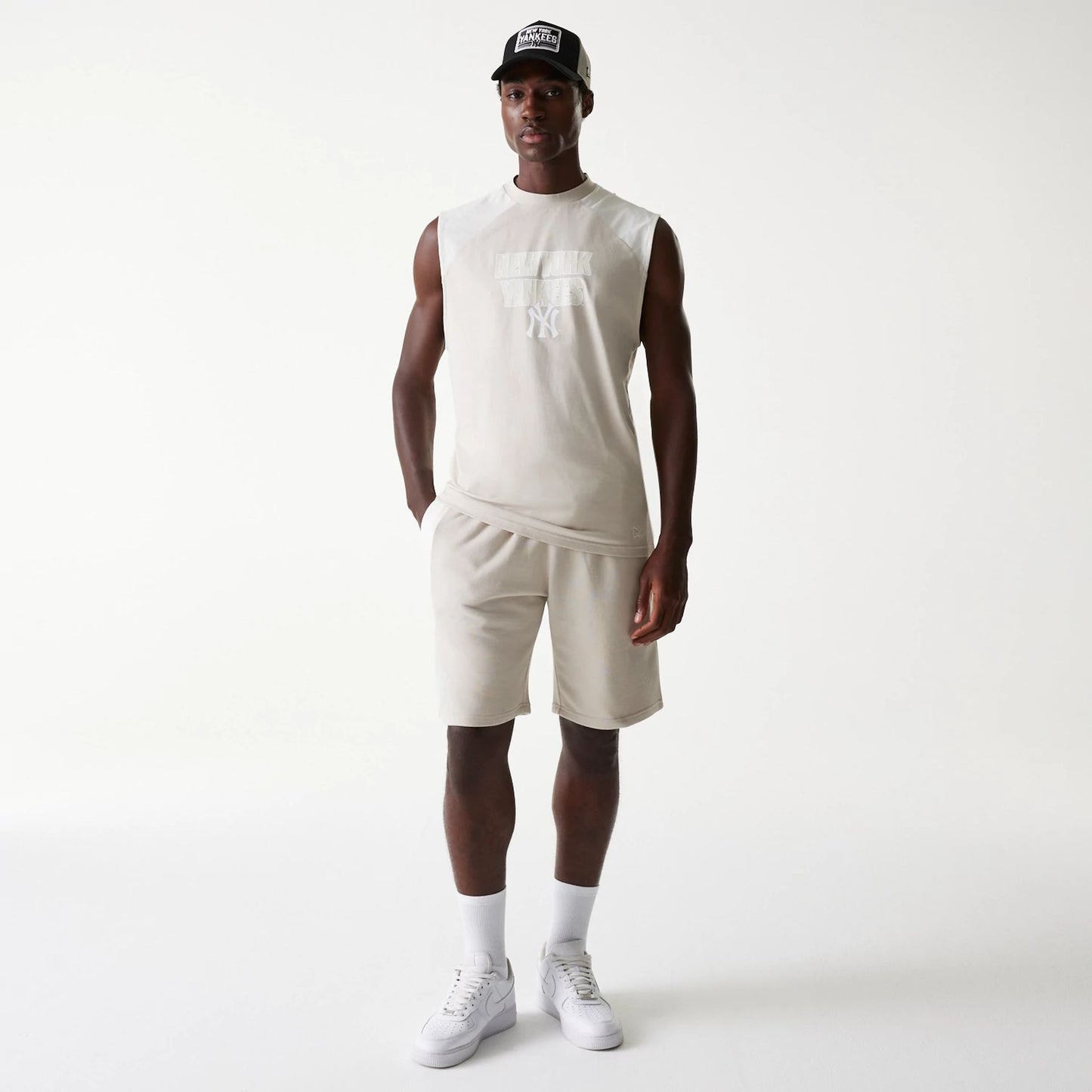 The Male model is wearing New York Yankees MLB Cream Sleeveless T-Shirt 8