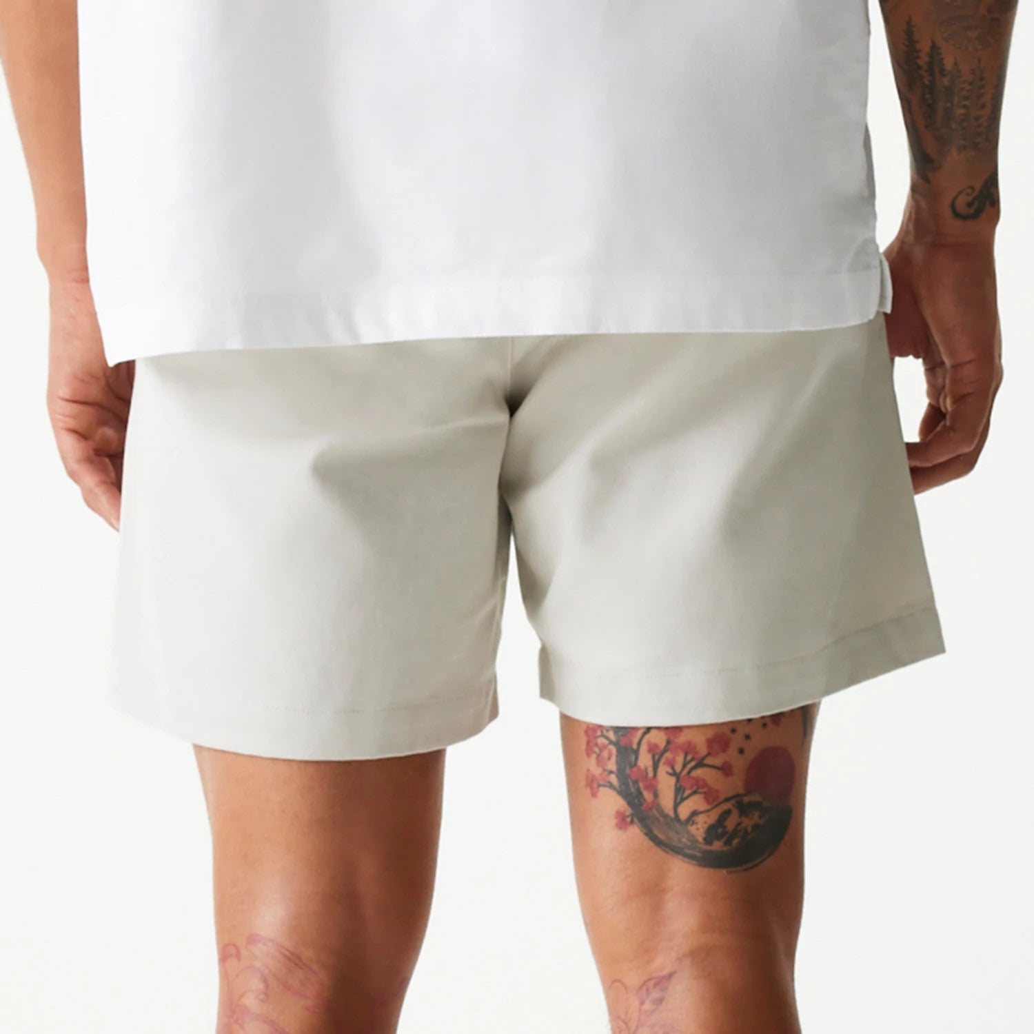 The Male model is wearing New Era Cream Chino Shorts 4