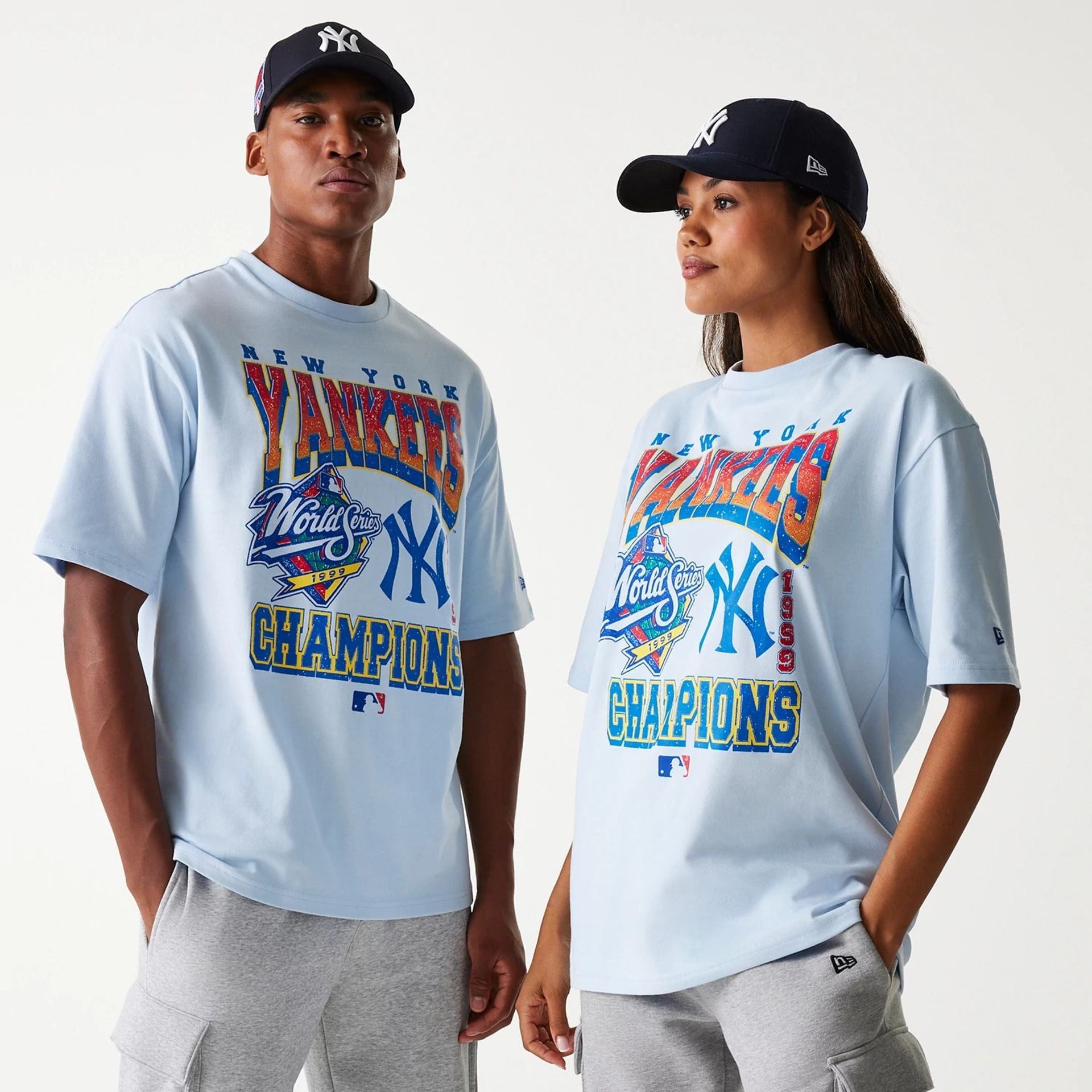 The Male model is wearing New York Yankees MLB World Series Pastel Blue Oversized T-Shirt 1