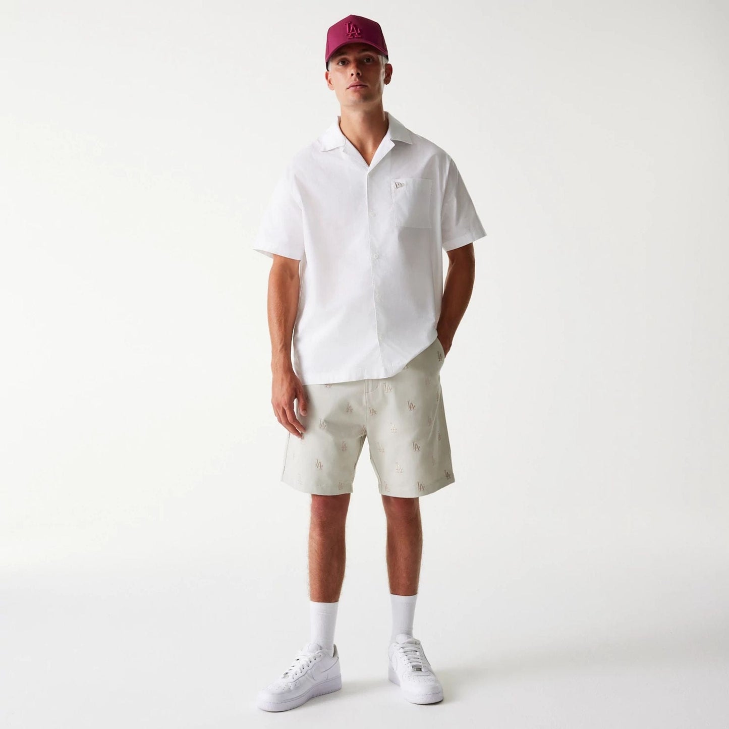 The Male model is wearing LA Dodgers MLB Monogram Cream Shorts 8