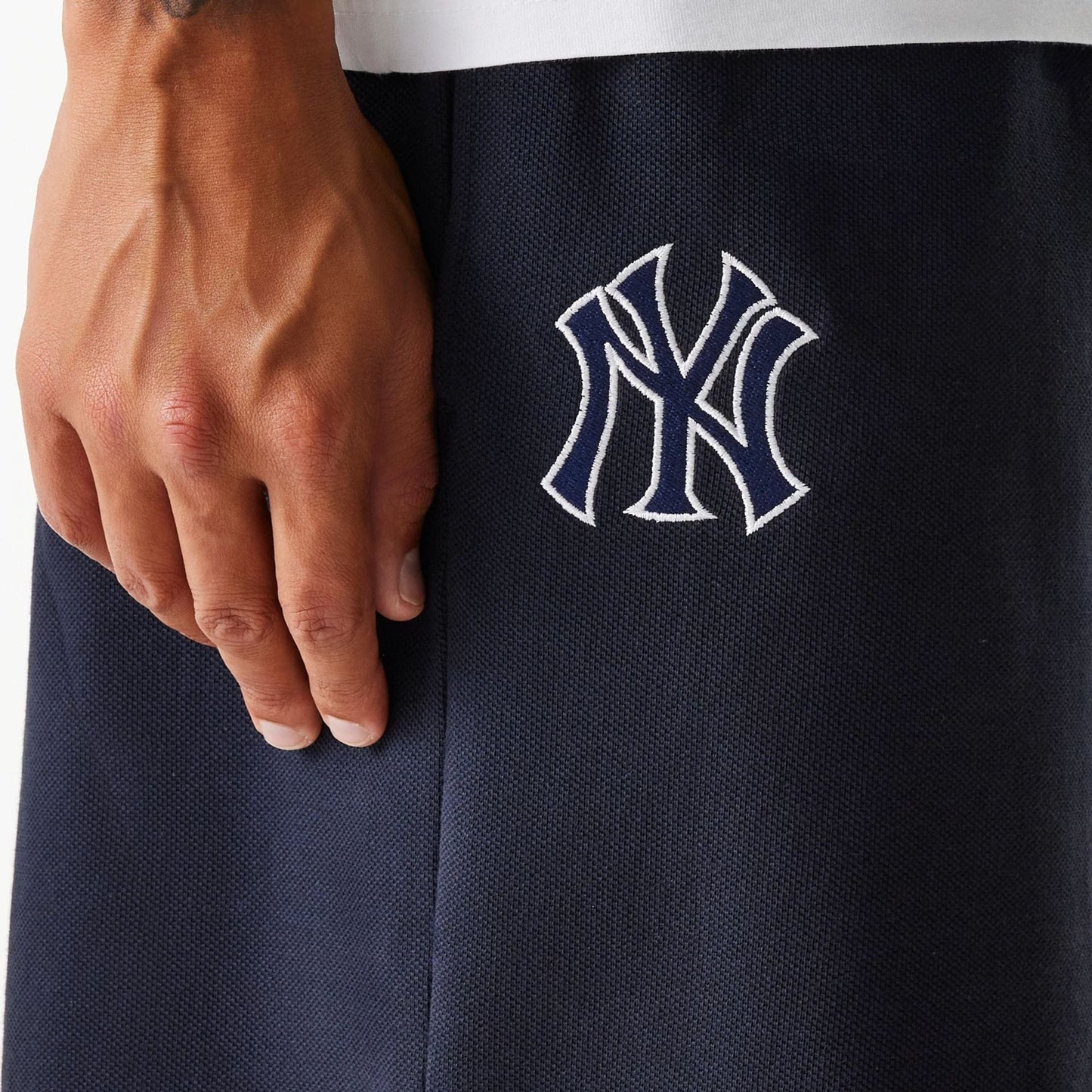 The Male model is wearing New York Yankees MLB Pique Navy Shorts 8