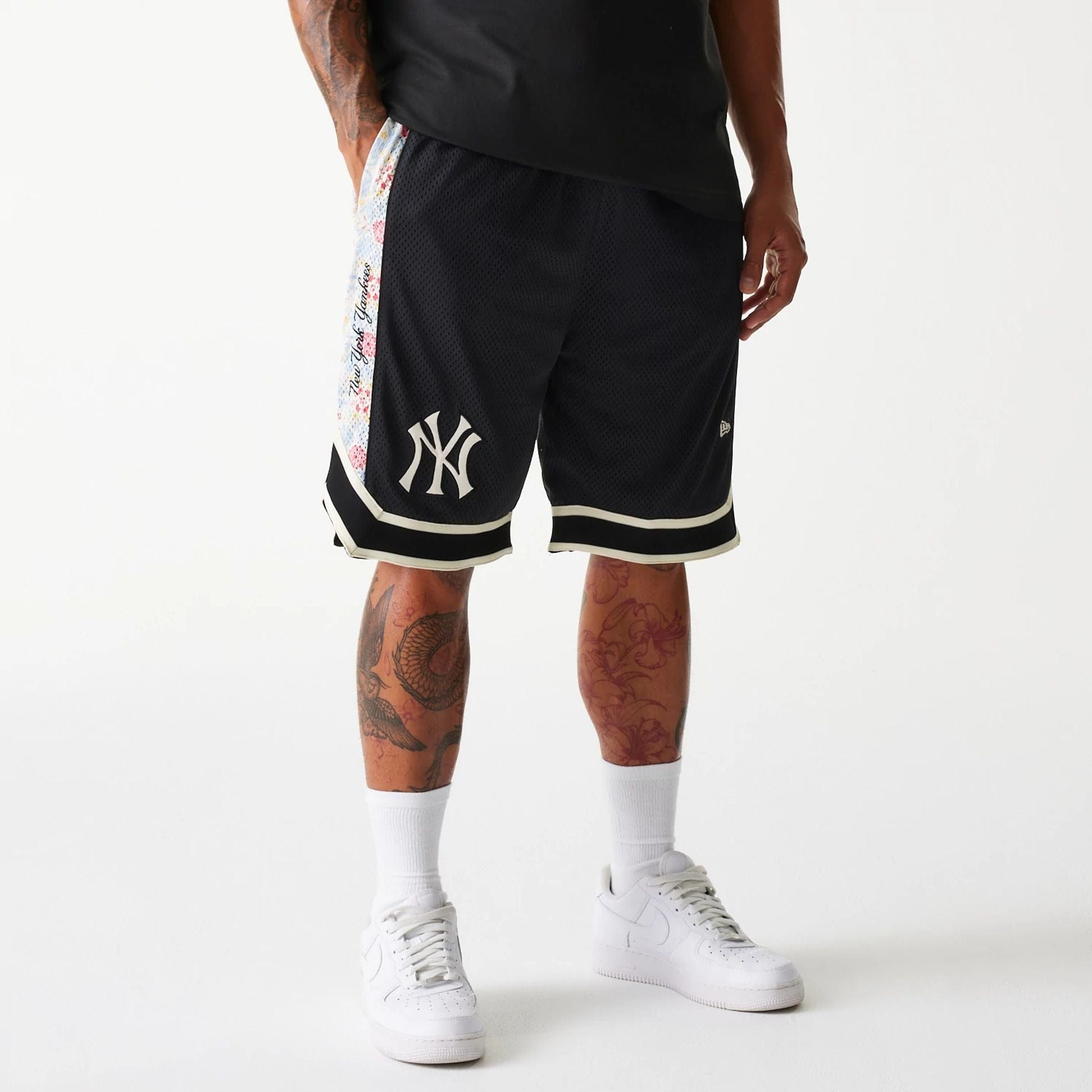 The Male model is wearing New York Yankees MLB Infill Black Mesh Shorts 1