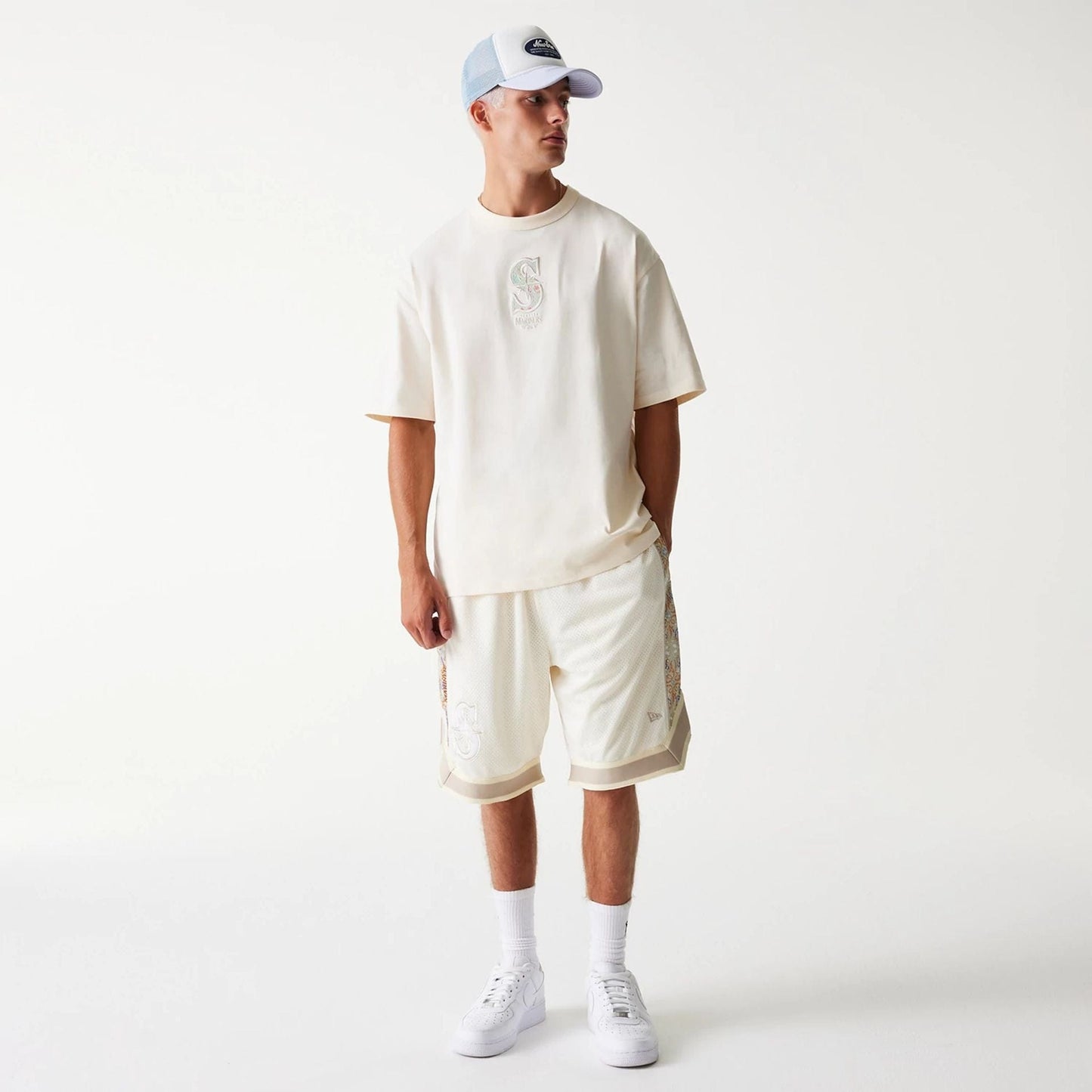 The Male model is wearing Seattle Mariners MLB Infill Open White Oversized T-Shirt 8