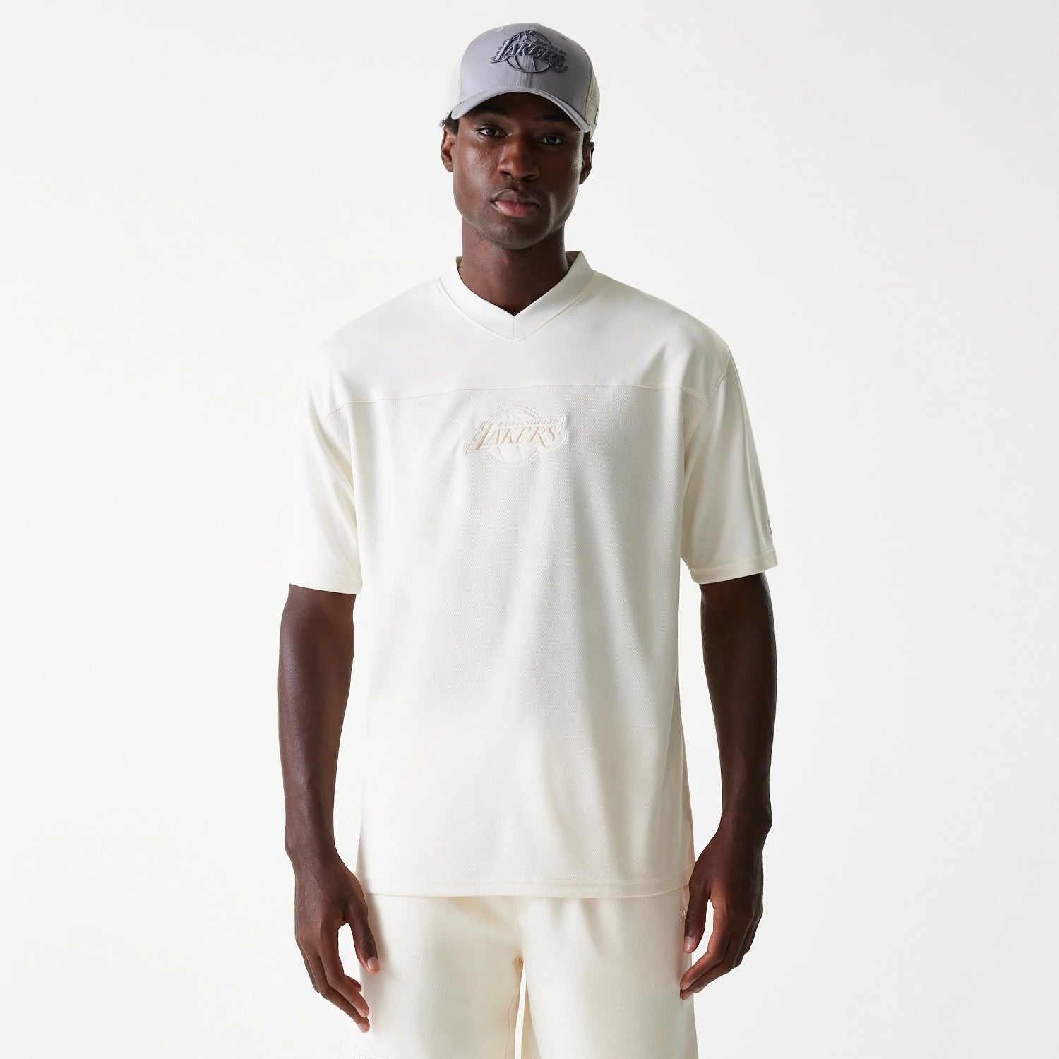 The Male model is wearing LA Lakers NBA Tonal Open White Mesh Jersey 1