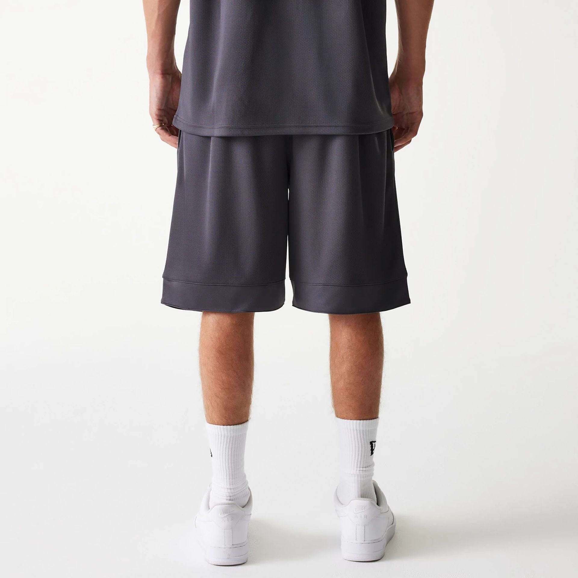 The Male model is wearing Chicago Bulls NBA Tonal Dark Grey Mesh Shorts 2