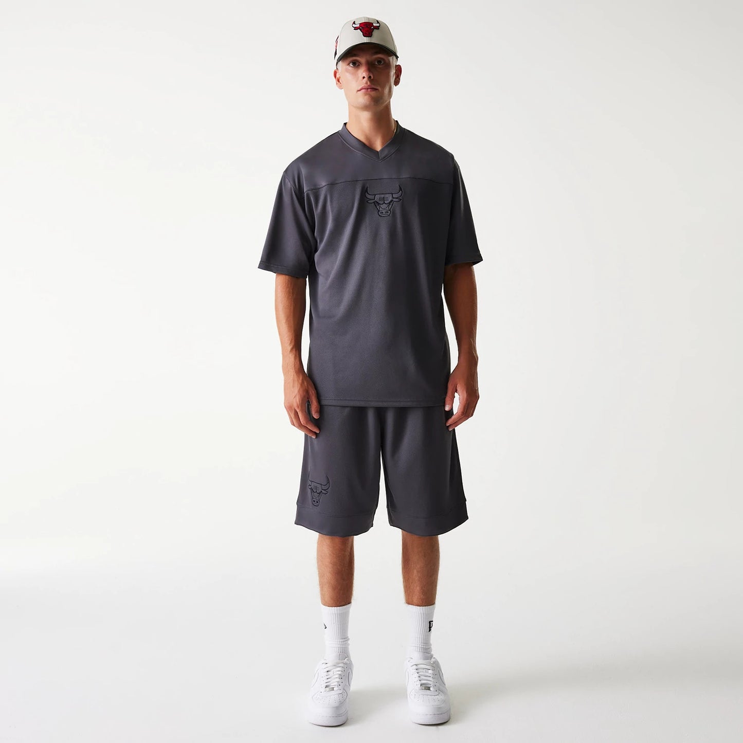 The Male model is wearing Chicago Bulls NBA Tonal Dark Grey Mesh Shorts 8