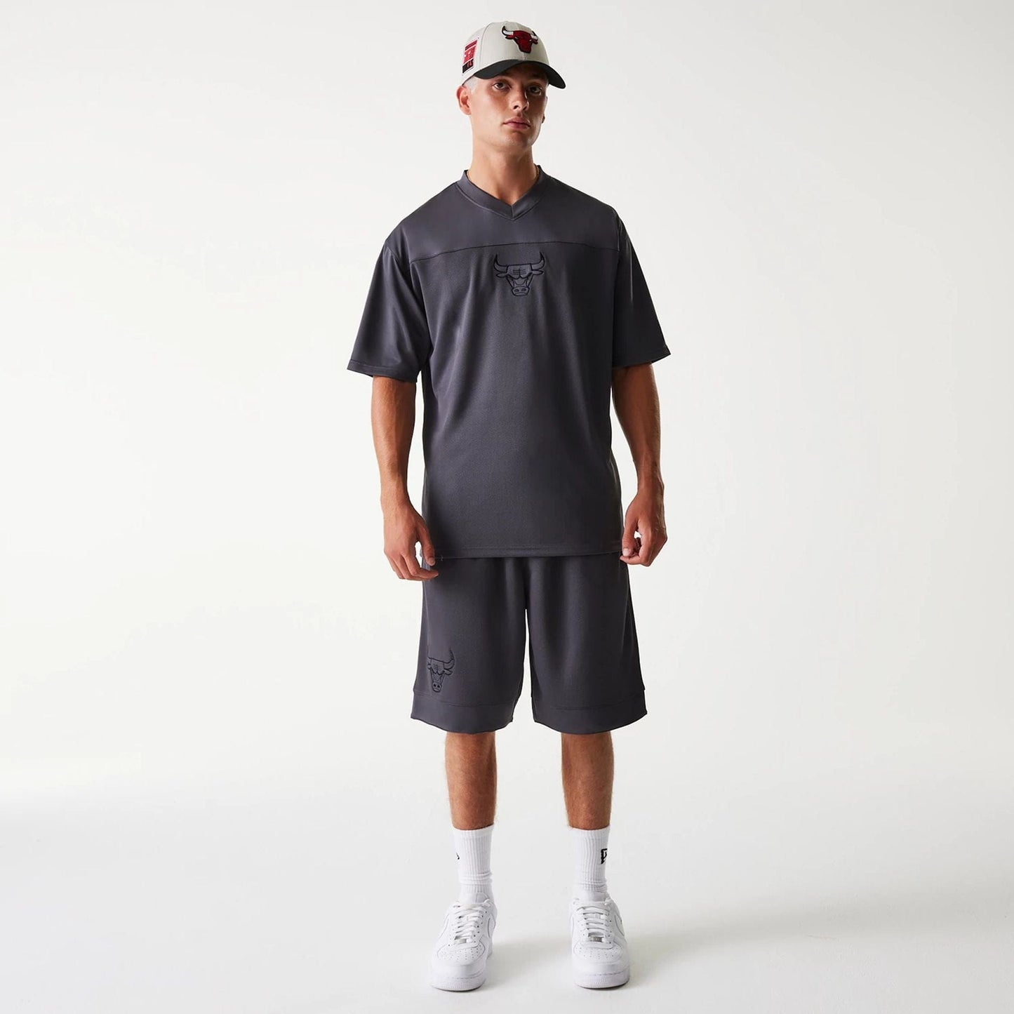 The Male model is wearing Chicago Bulls NBA Tonal Dark Grey Mesh Jersey 8