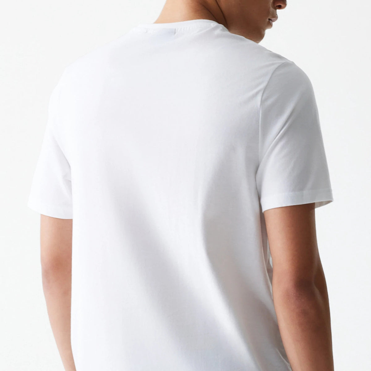 The Male model is wearing LA Lakers NBA Logo White T-Shirt 7