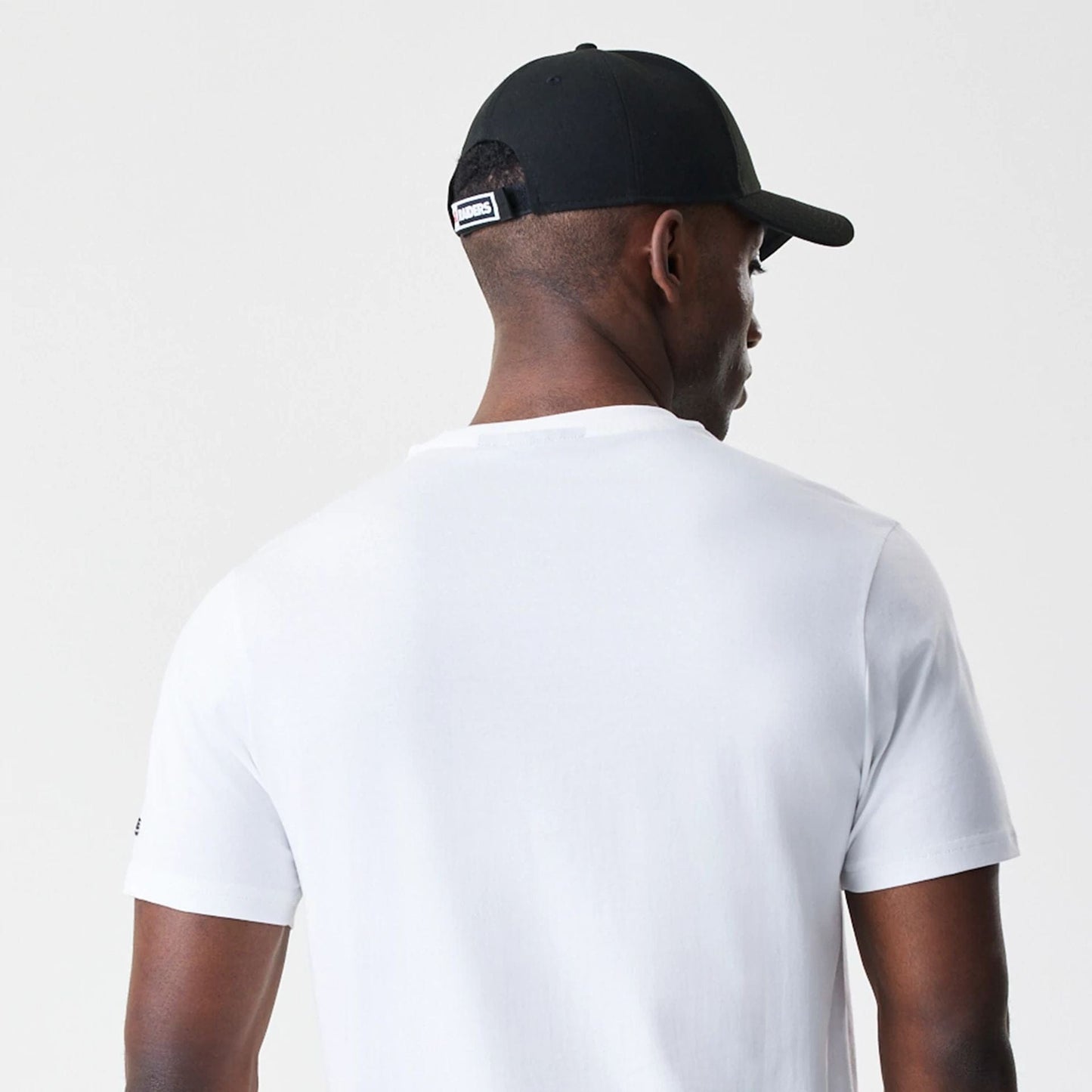 The Male model is wearing Las Vegas Raiders NFL Logo White T-Shirt 7