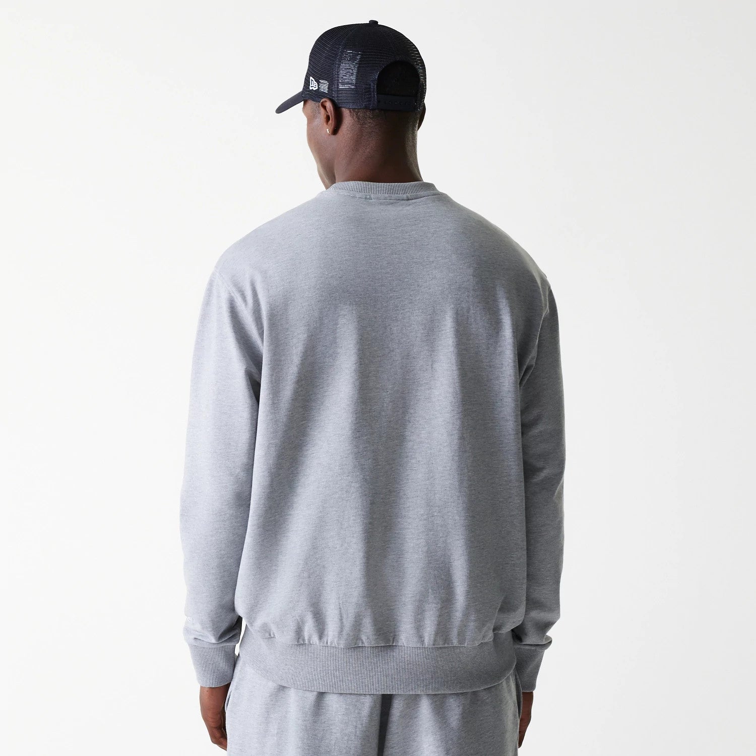 The Male model is wearing New York Yankees MLB League Essential Grey Crew Neck Sweater. 2